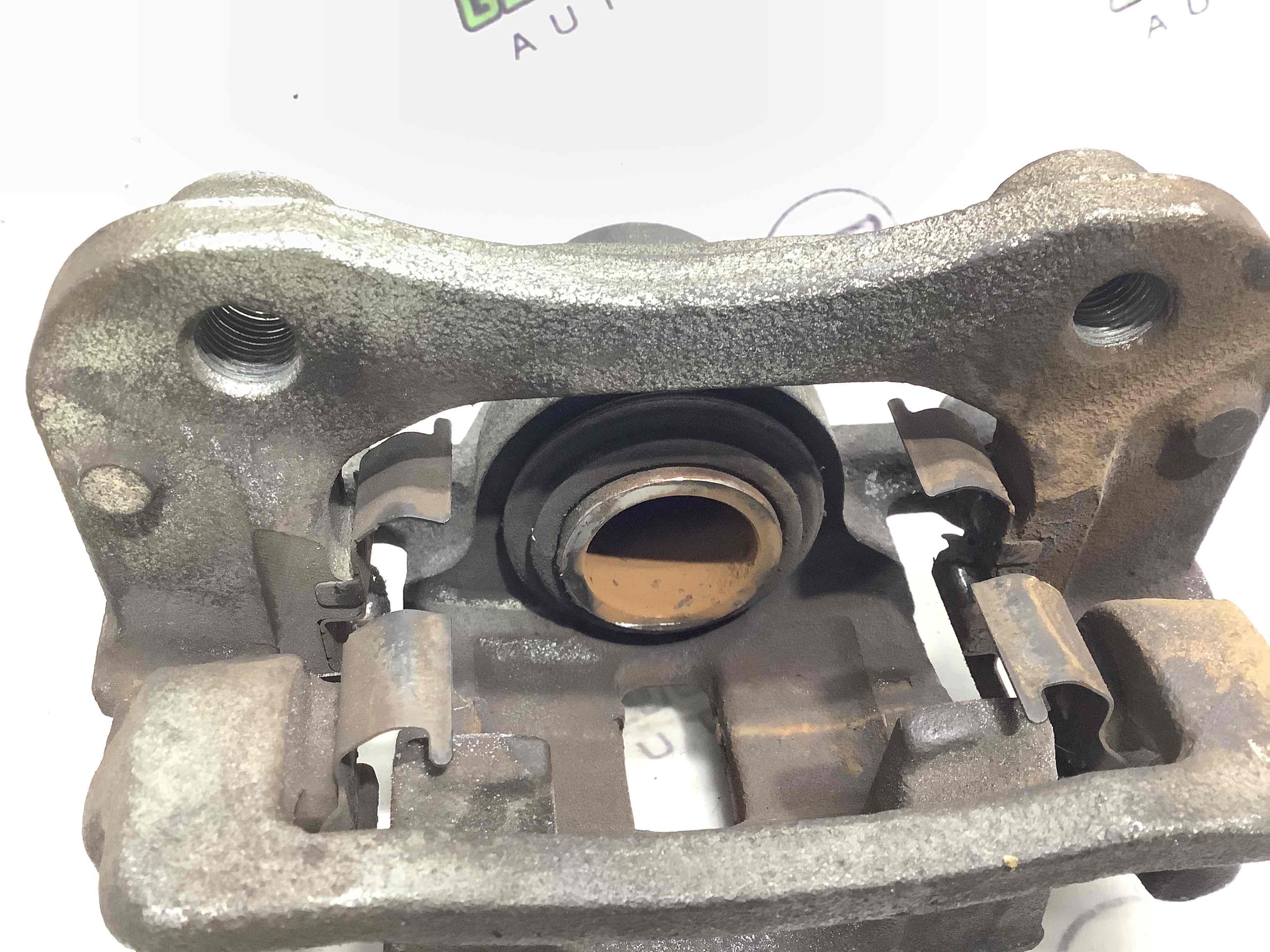 Супорт задній правий