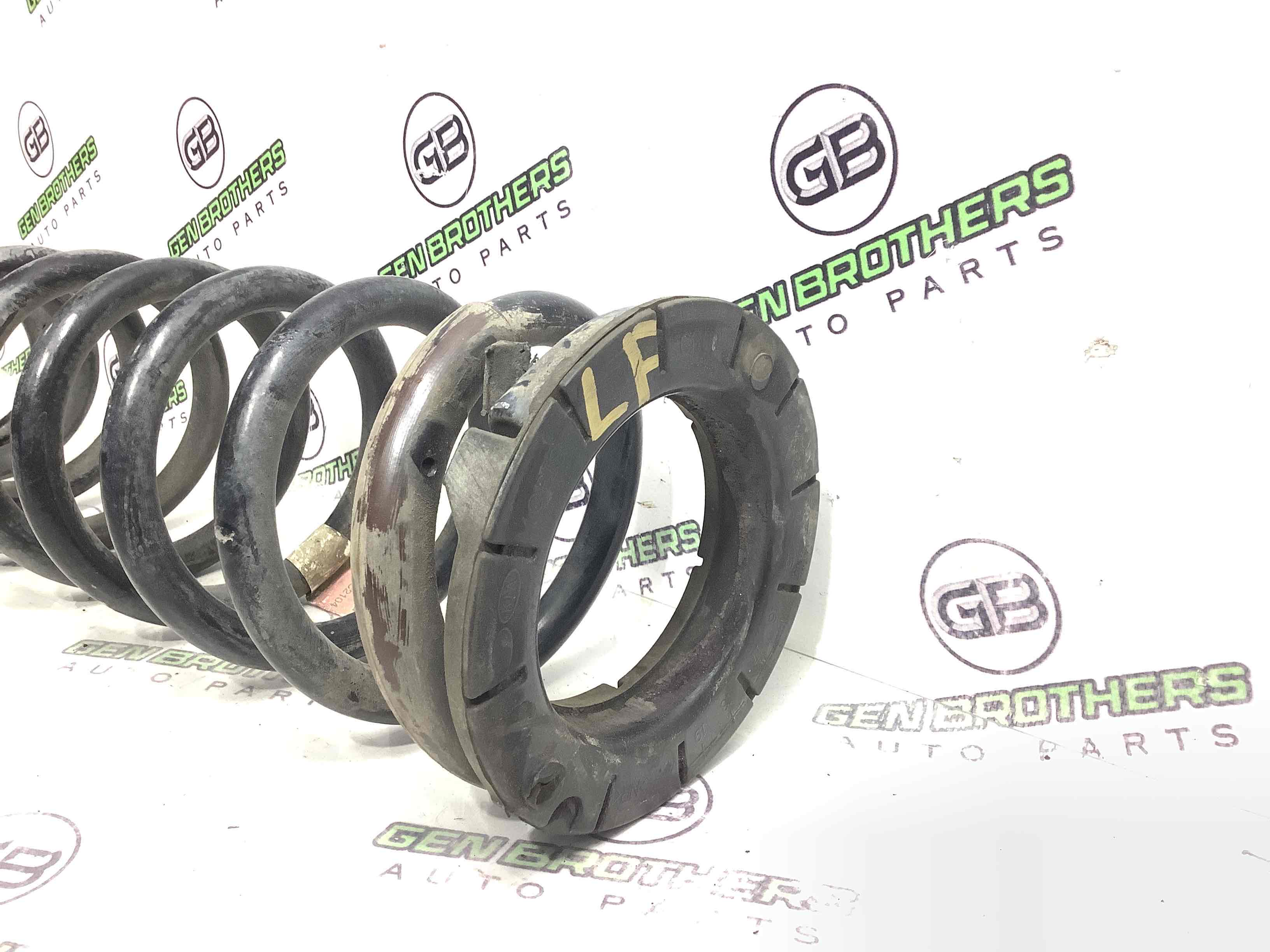 Пружина задня