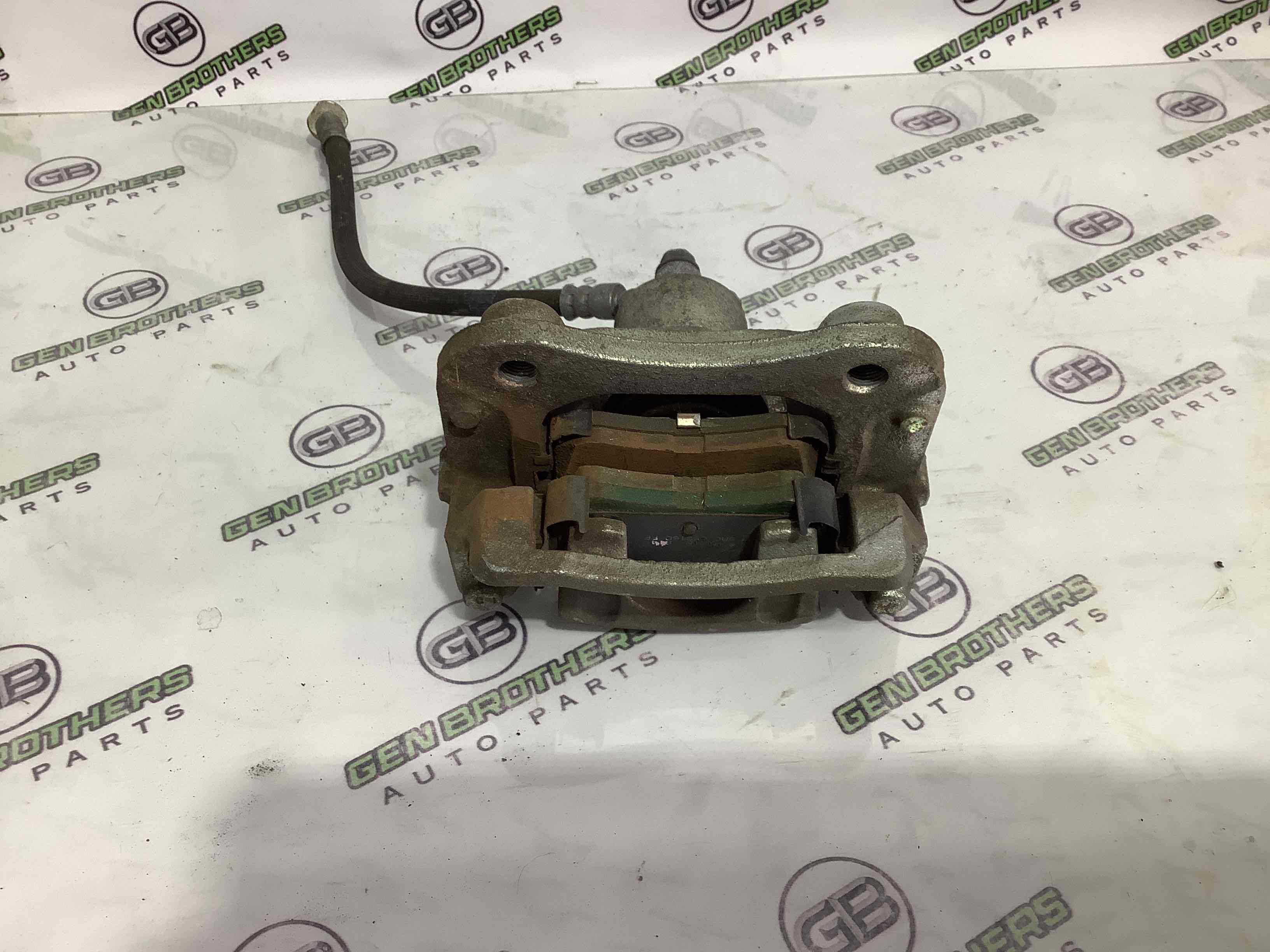 Супорт задній лівий