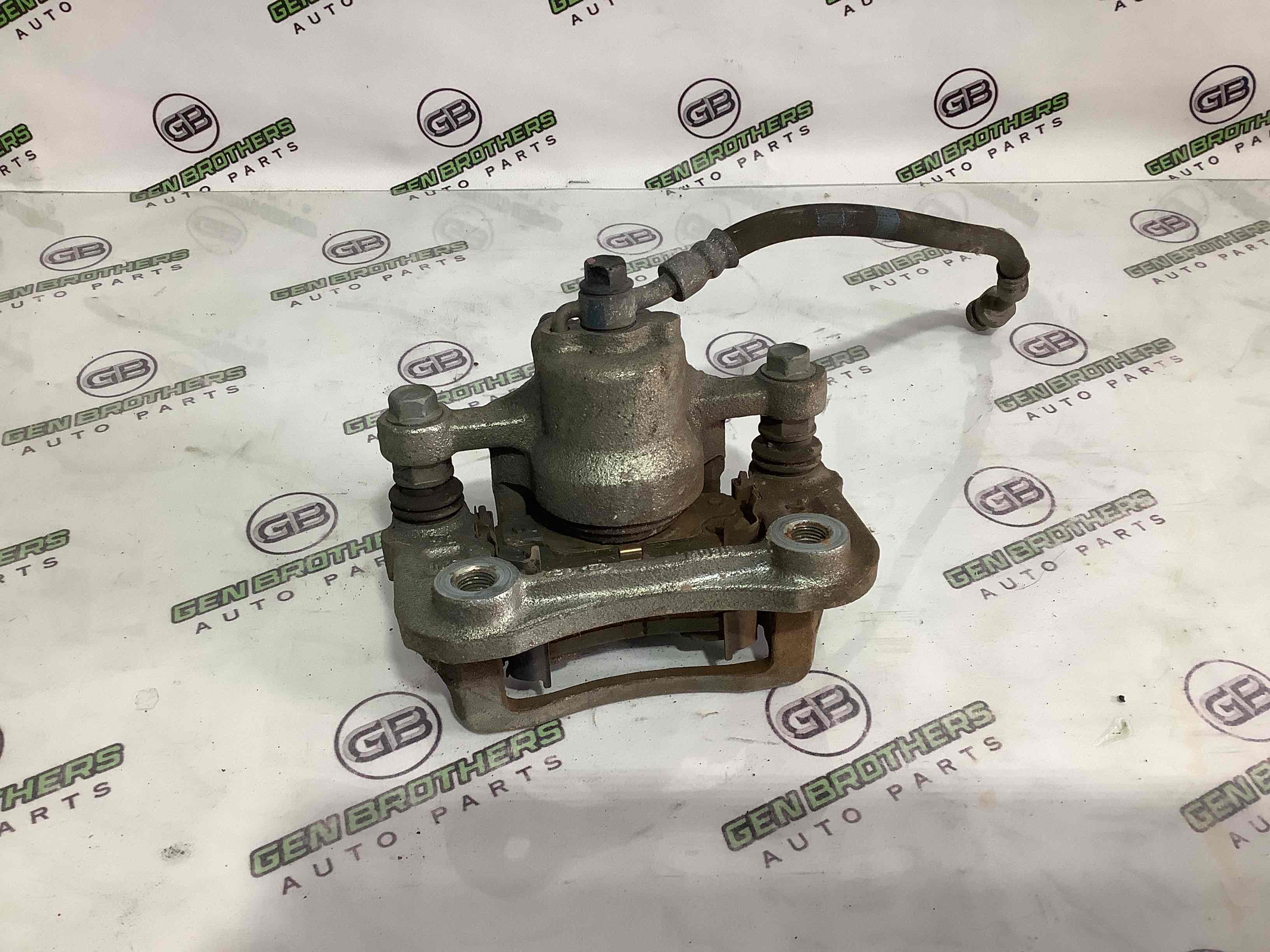 Супорт задній правий