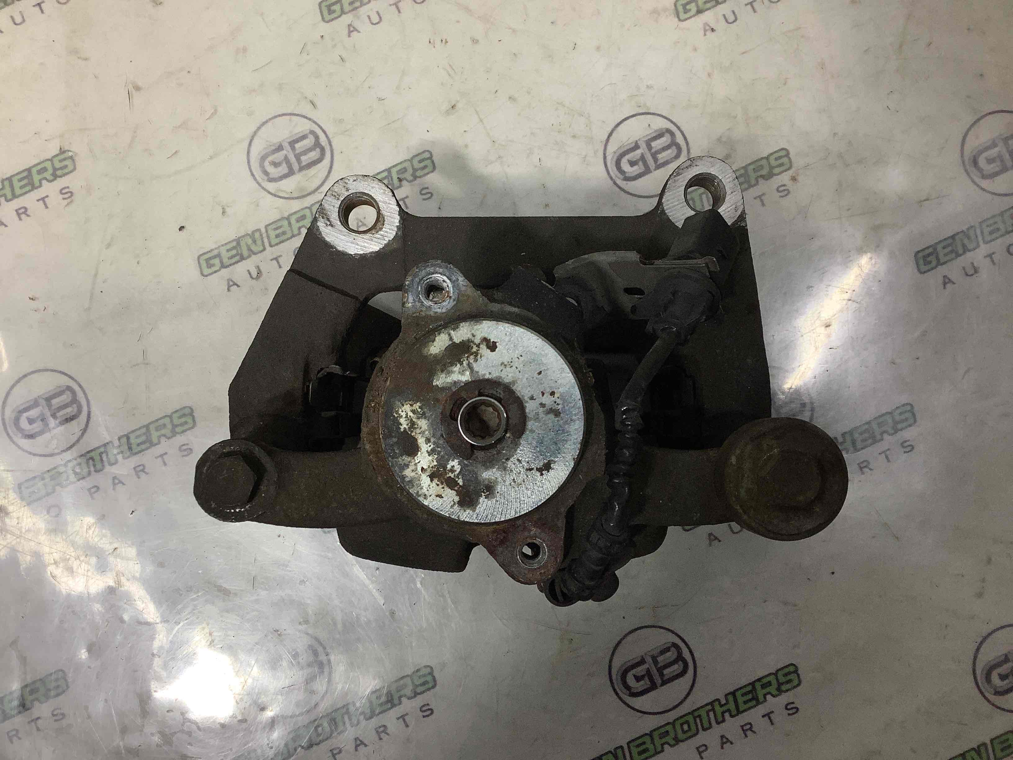 Суппорт задний левый