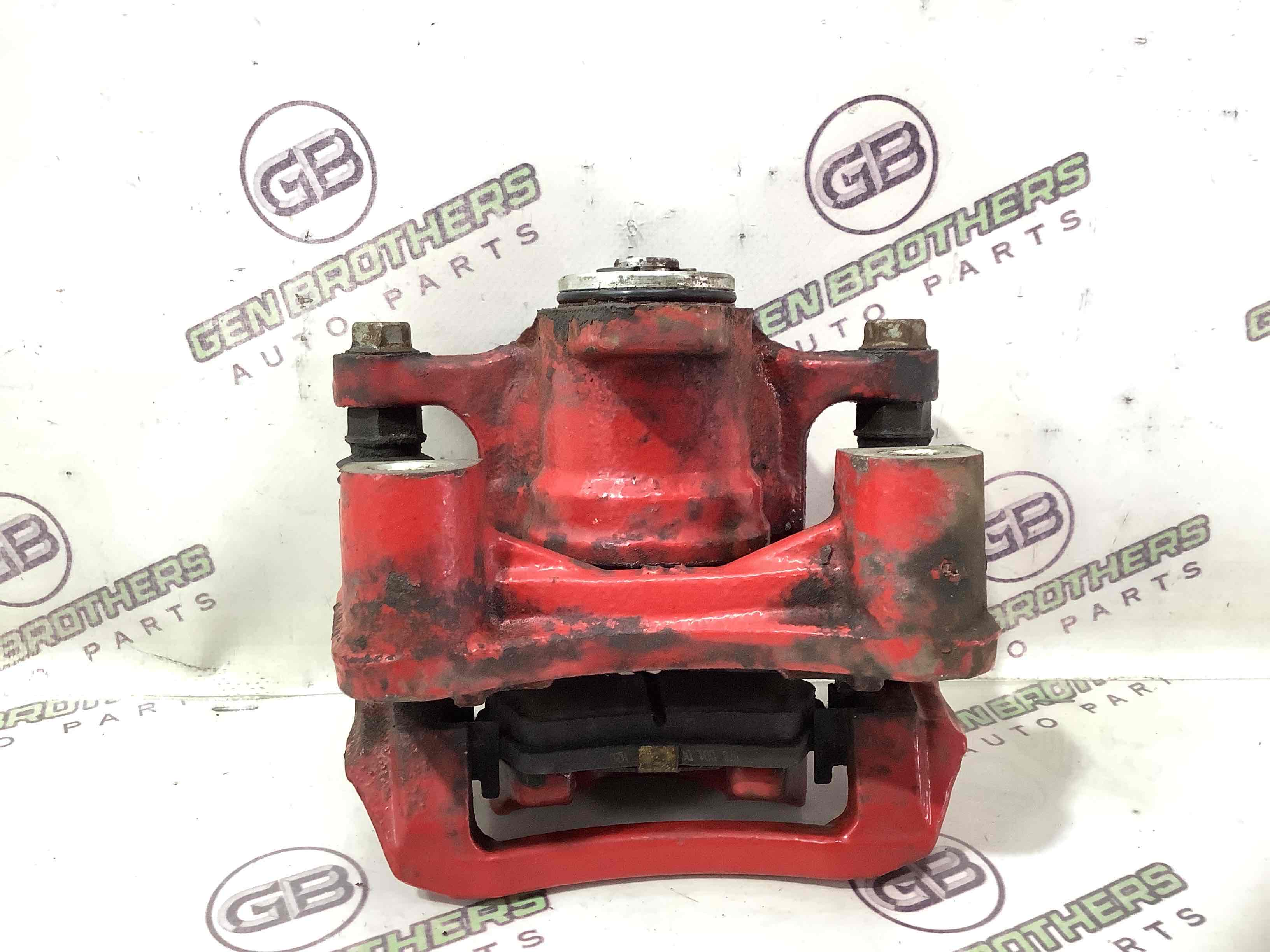 Супорт задній правий