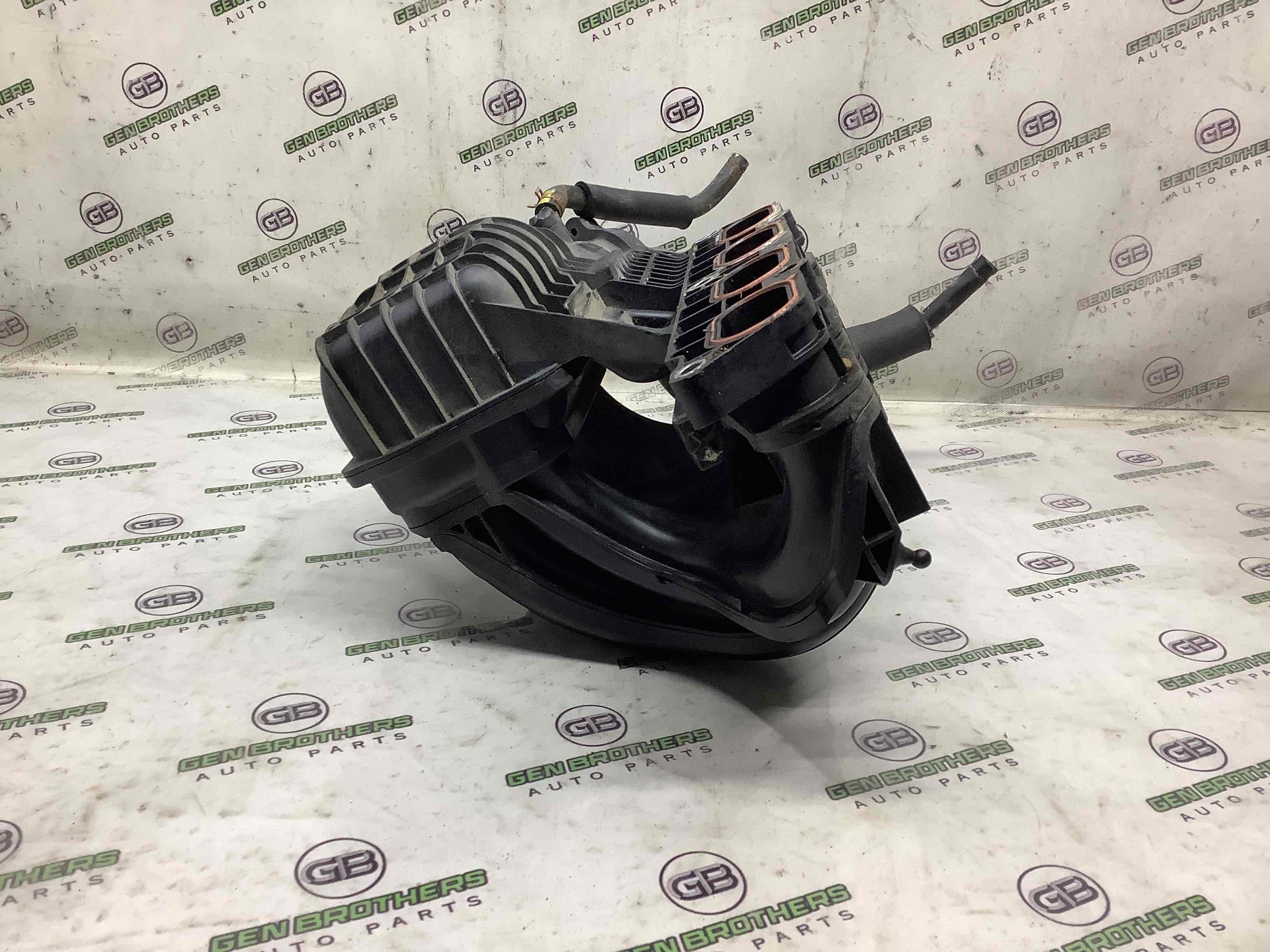 Колектор впускний