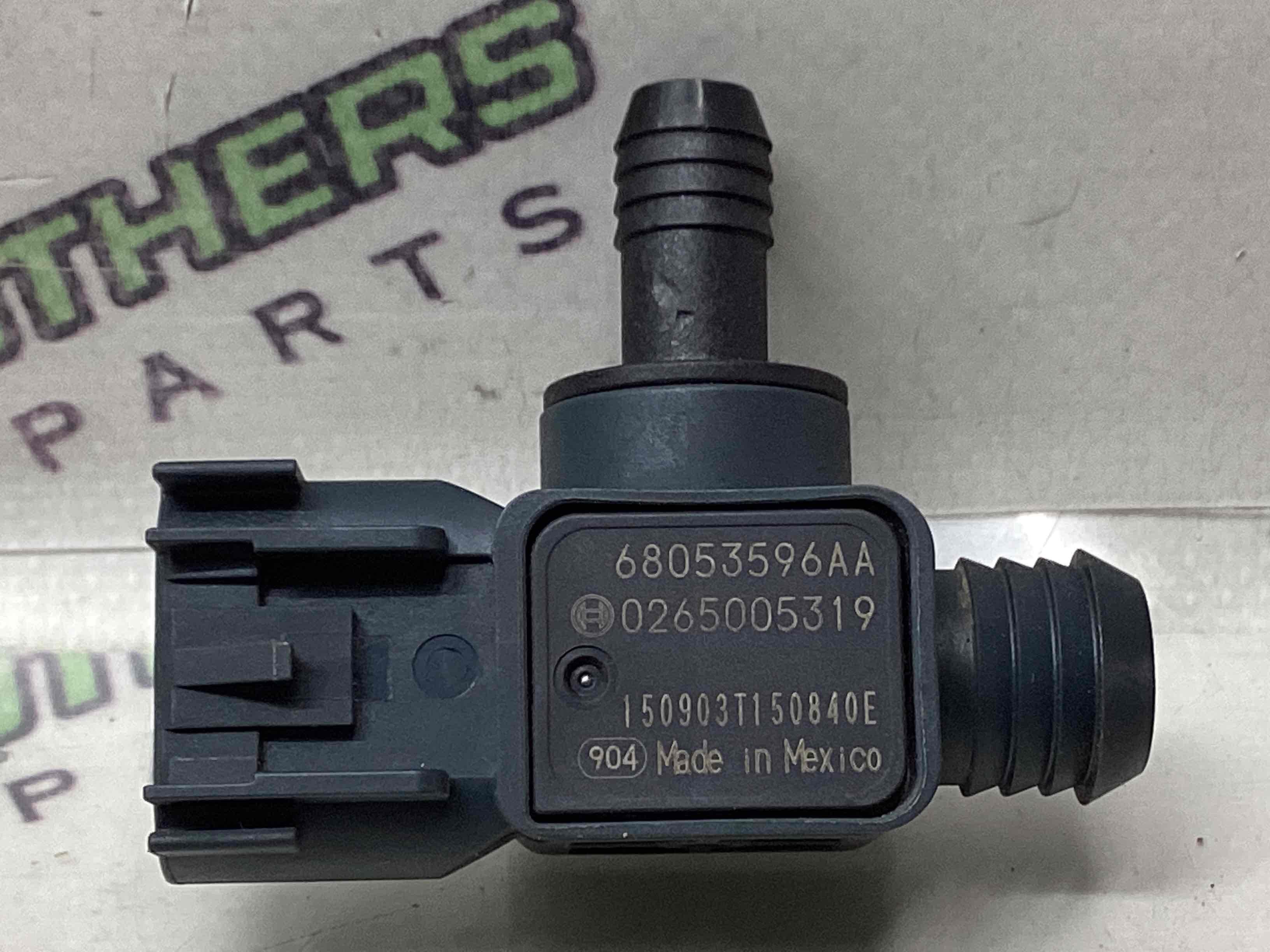 Клапан вакуумний