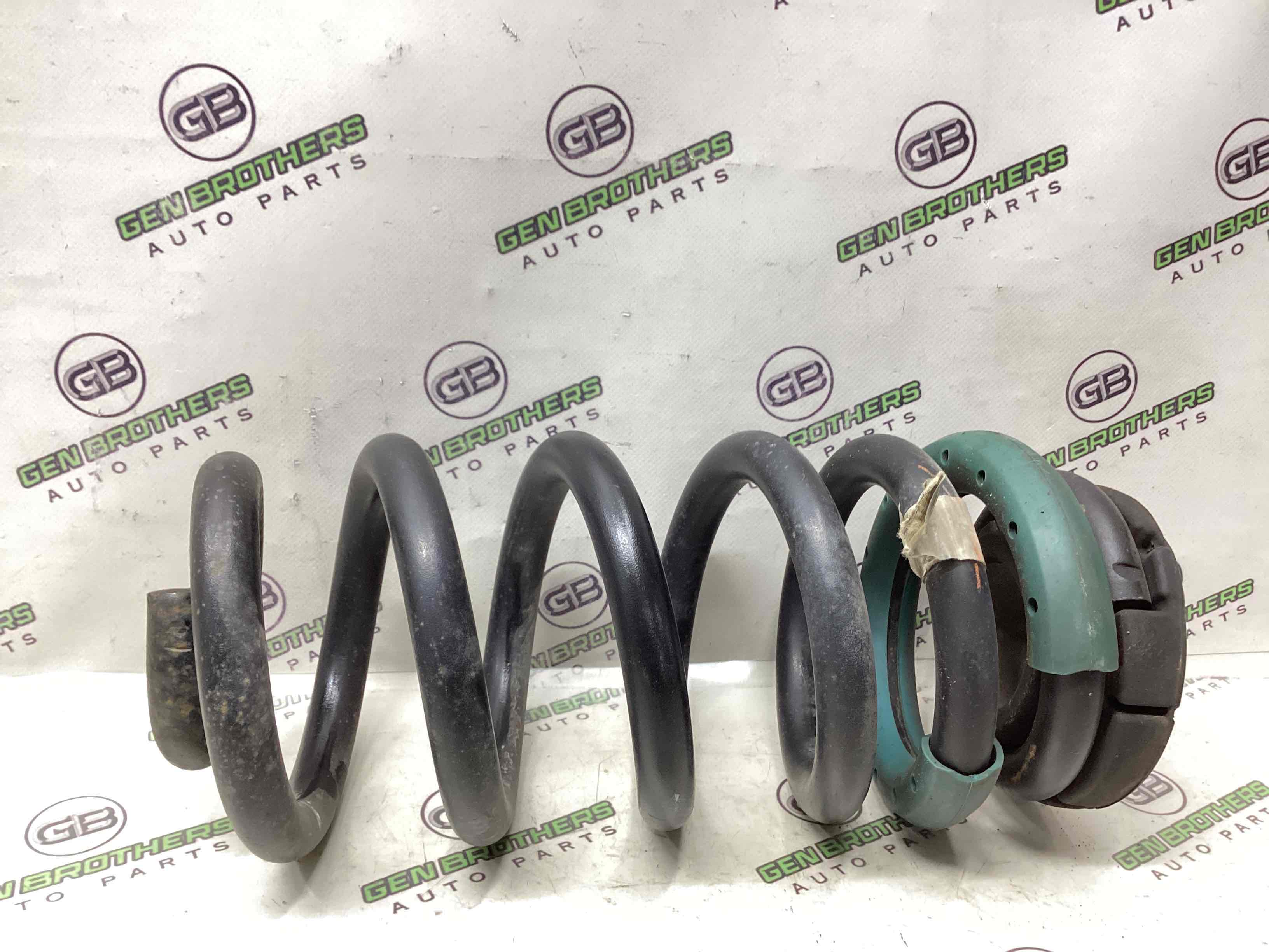 Пружина задняя