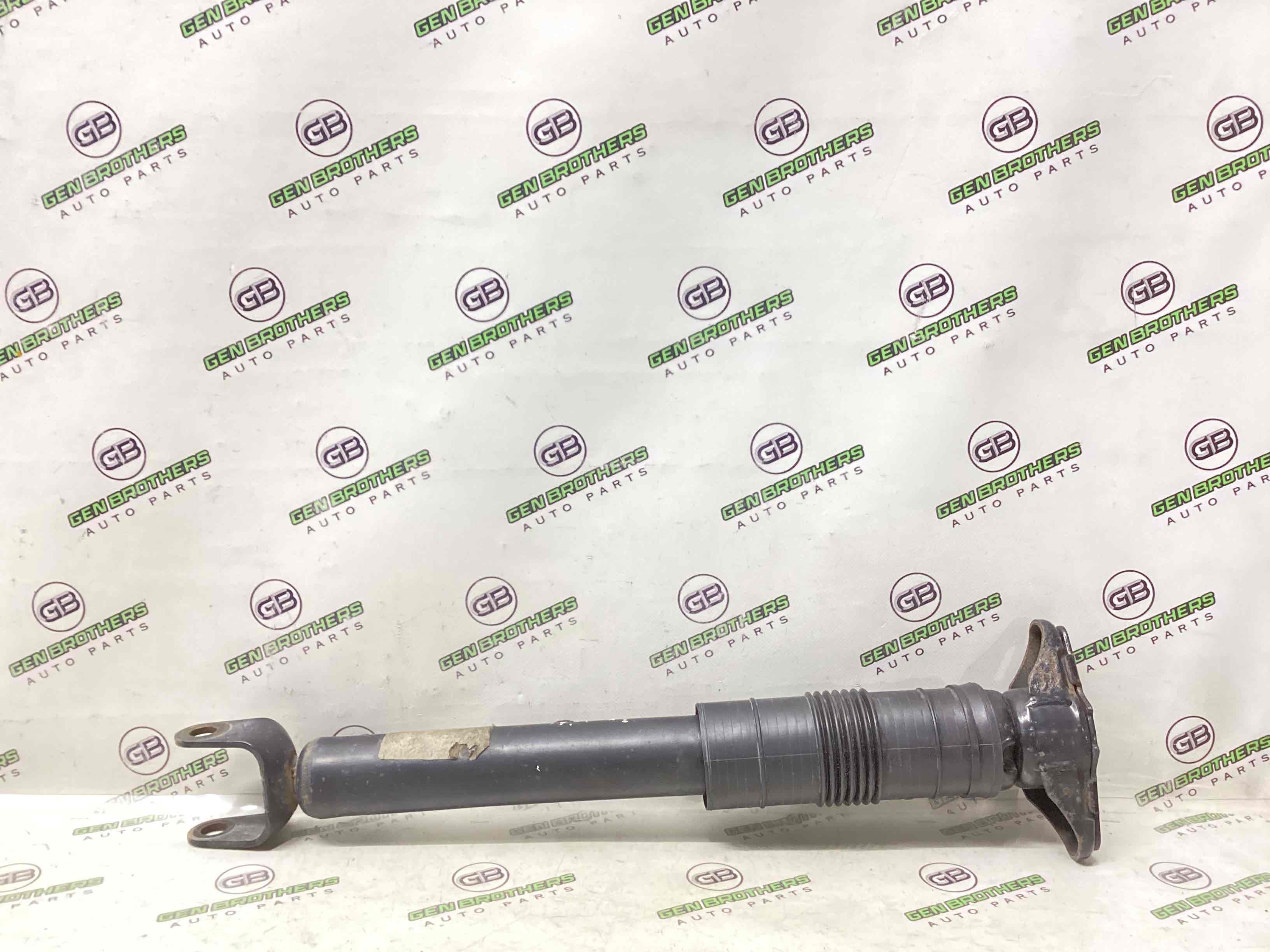 Амортизатор задній лівий