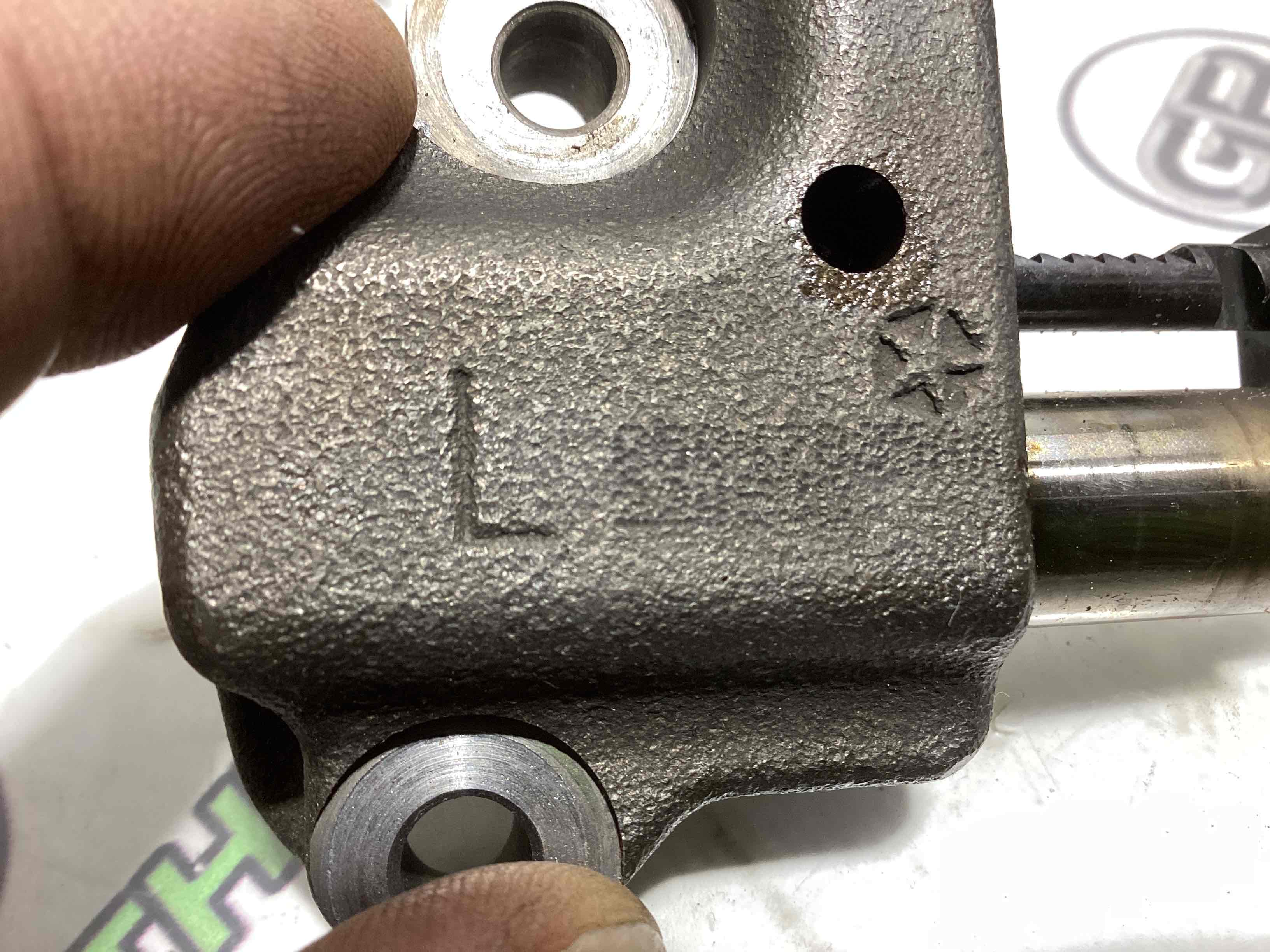 Механізм натягу ременя, ланцюга, ролика