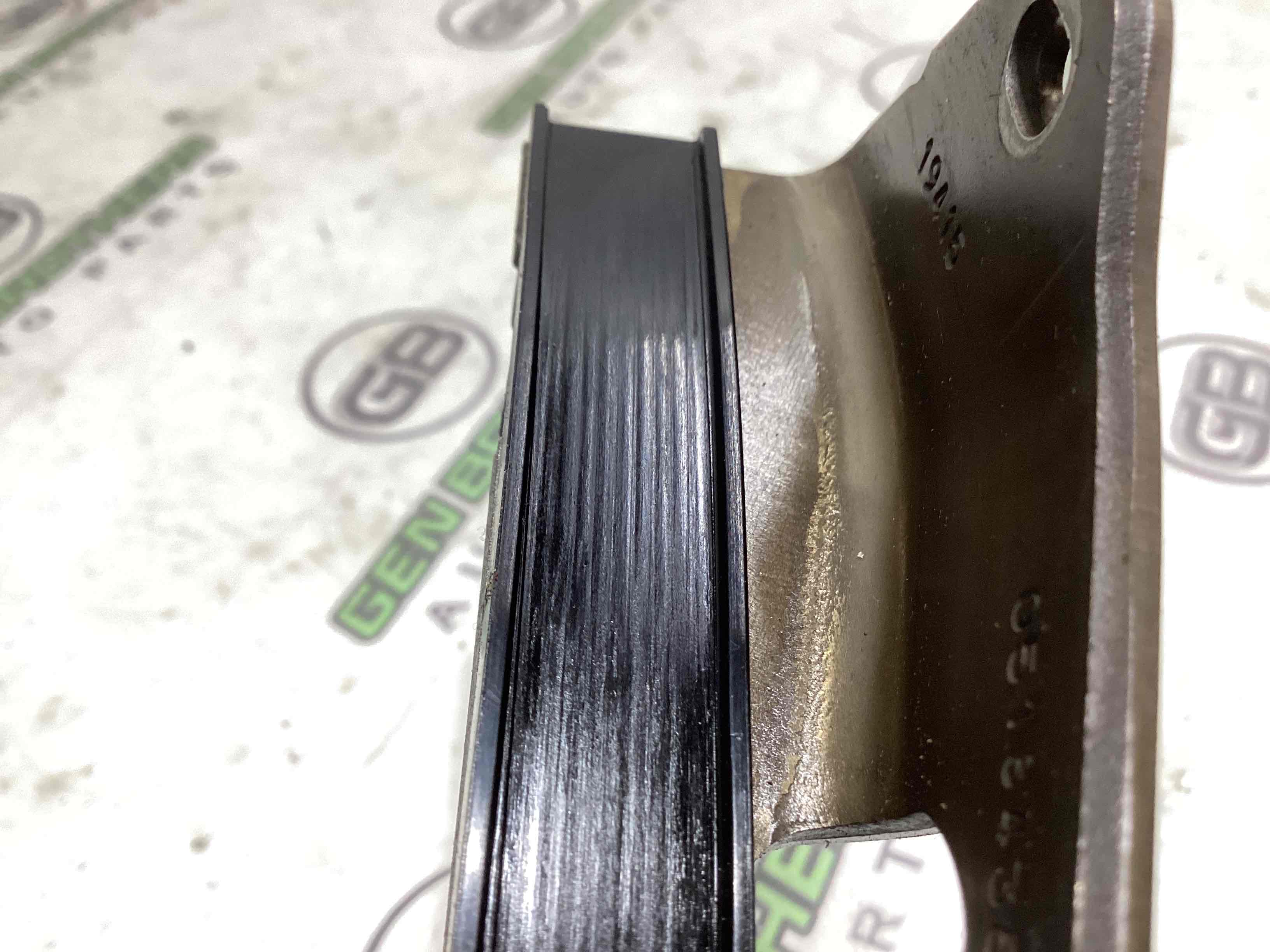 Механізм натягу ременя, ланцюга, ролика