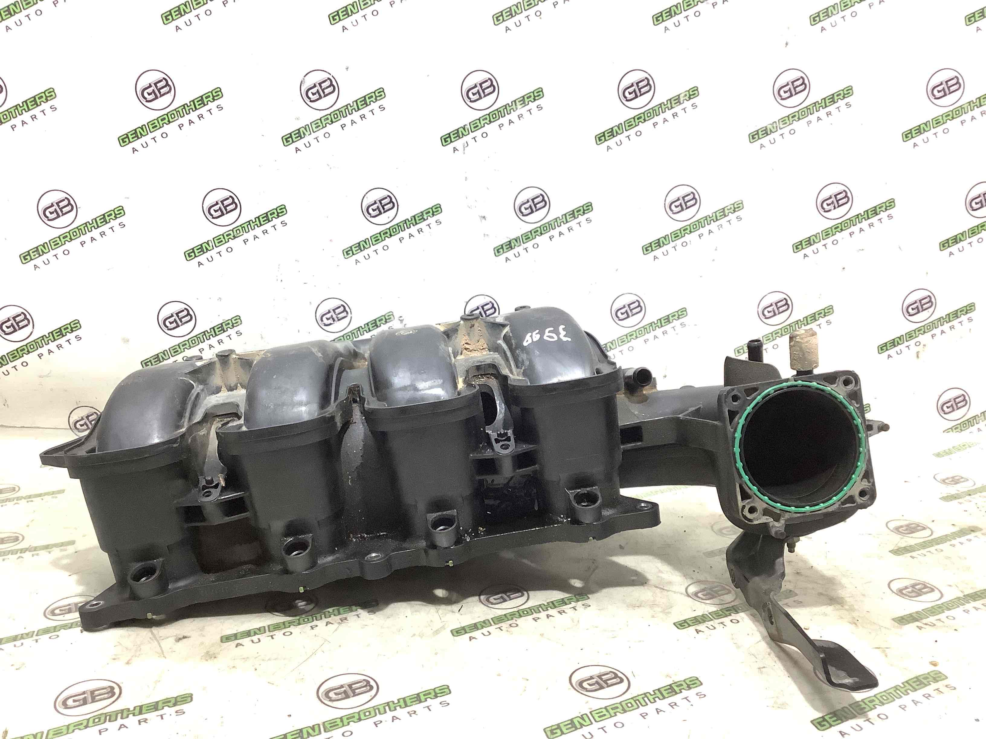 Колектор впускний