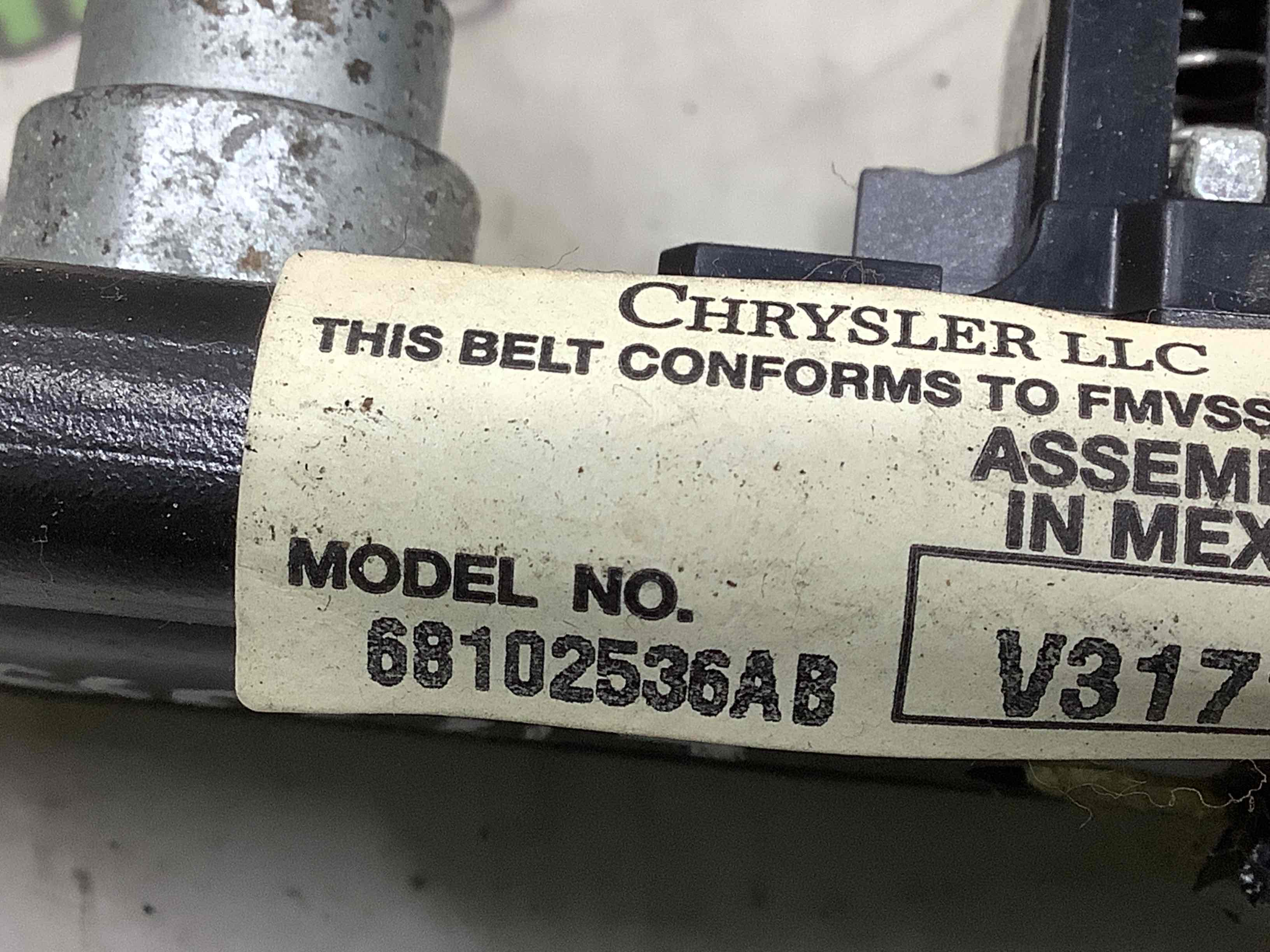 Регулятор висоти ременя безпеки