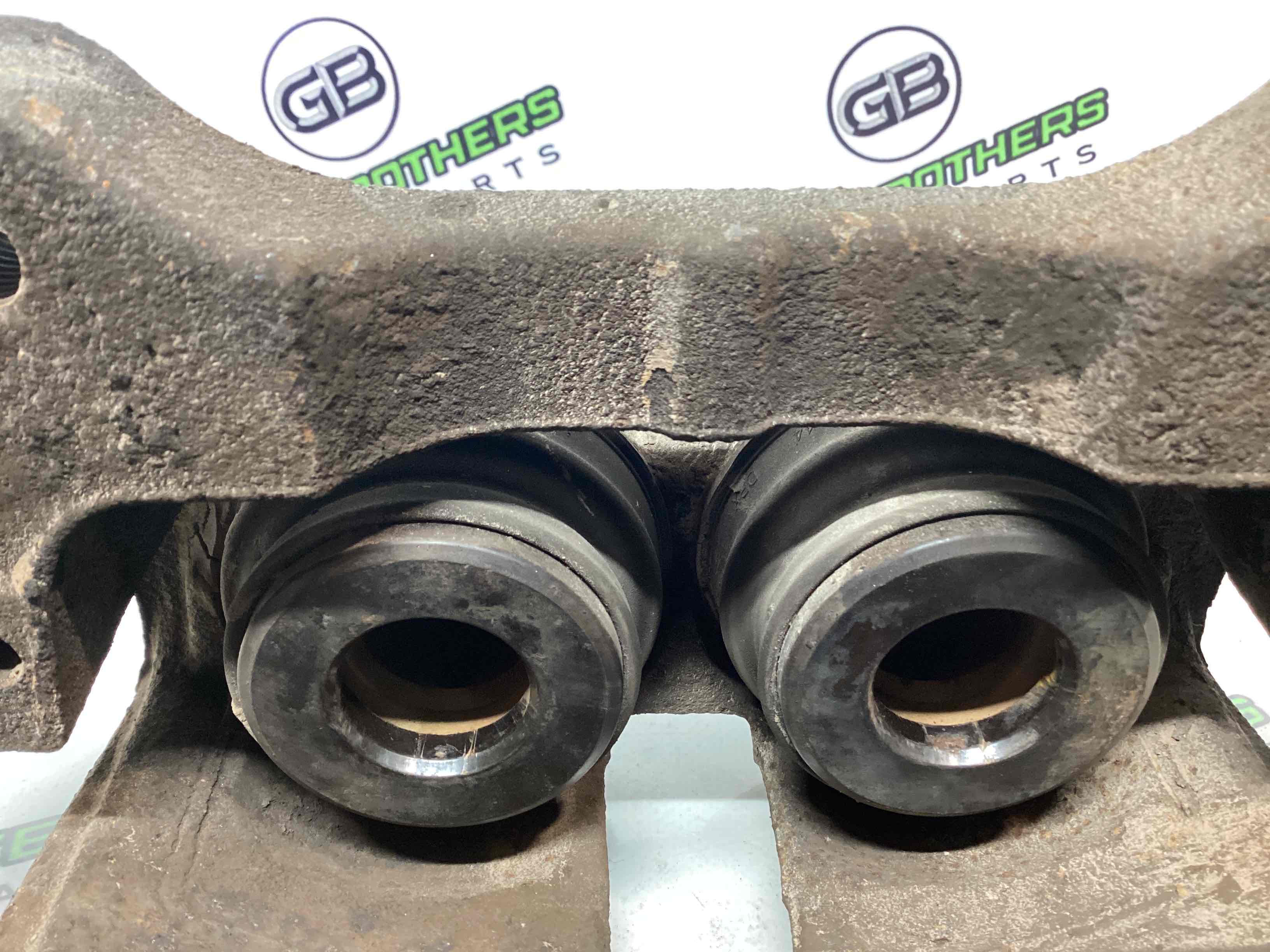 Супорт передній лівий