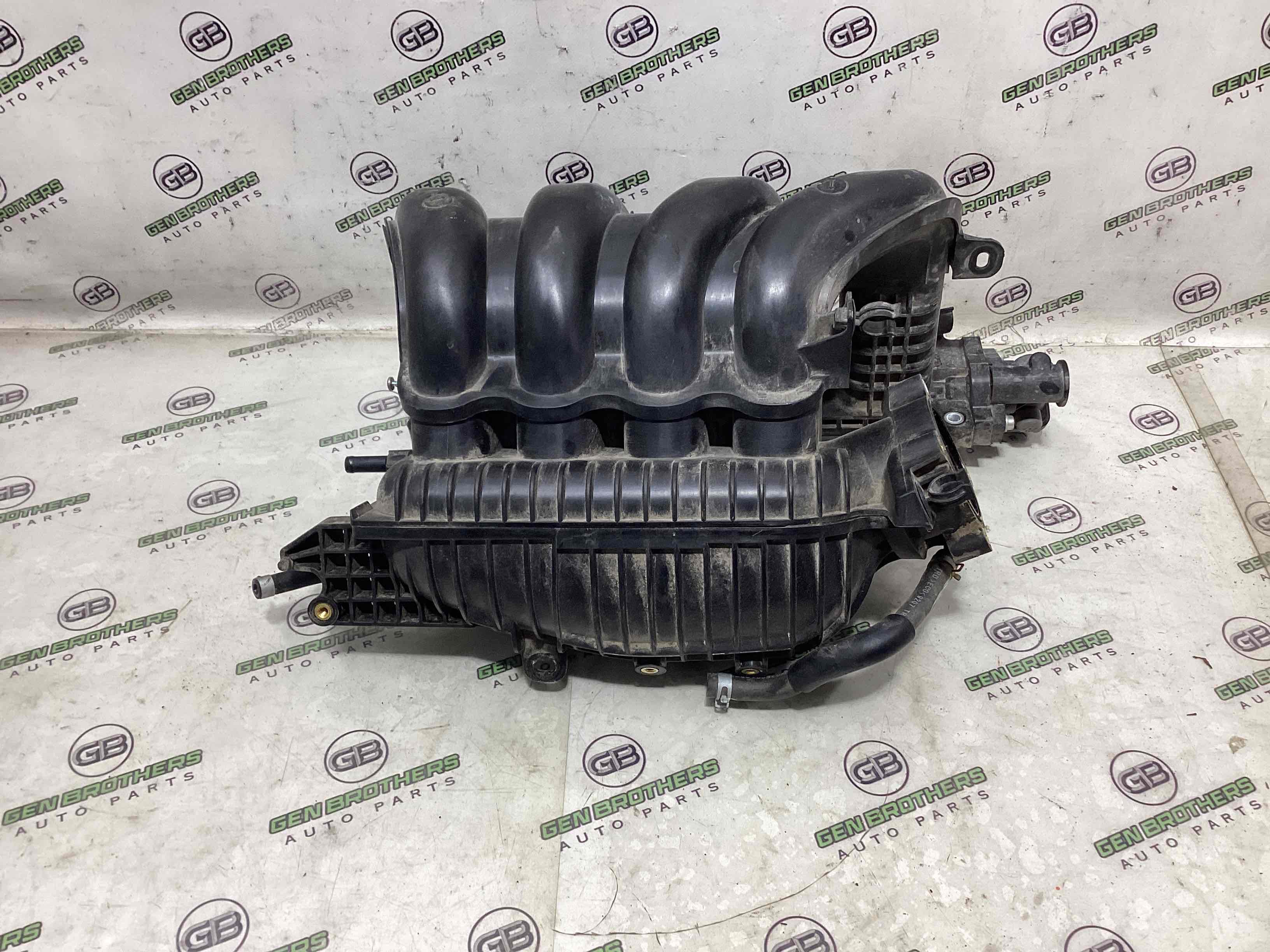 Колектор впускний