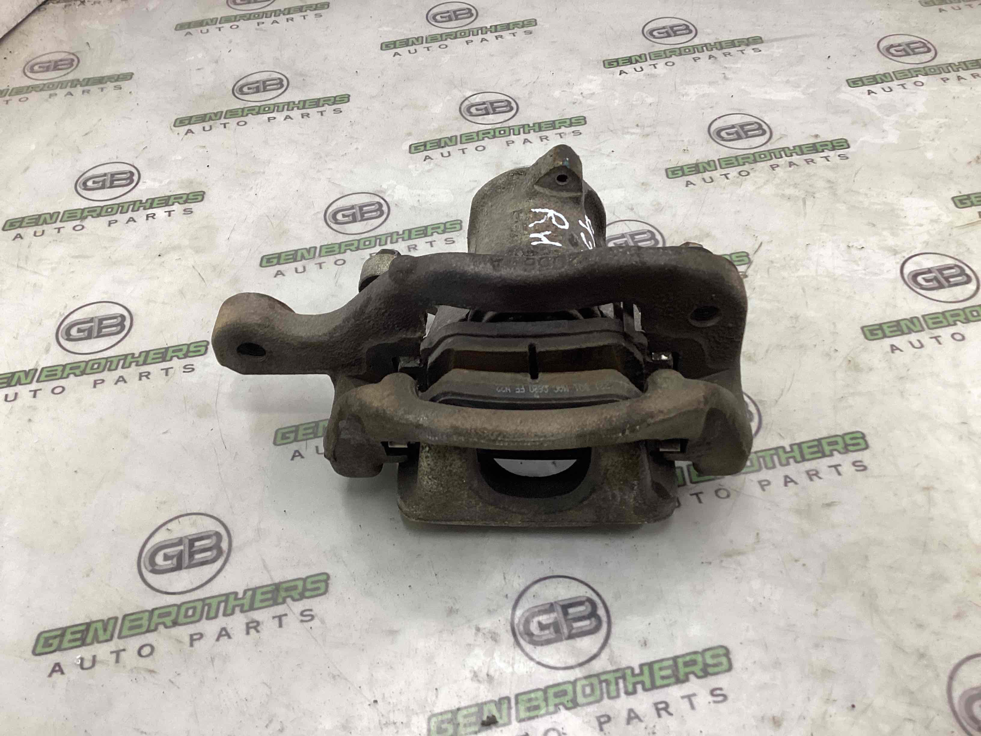 Супорт задній правий