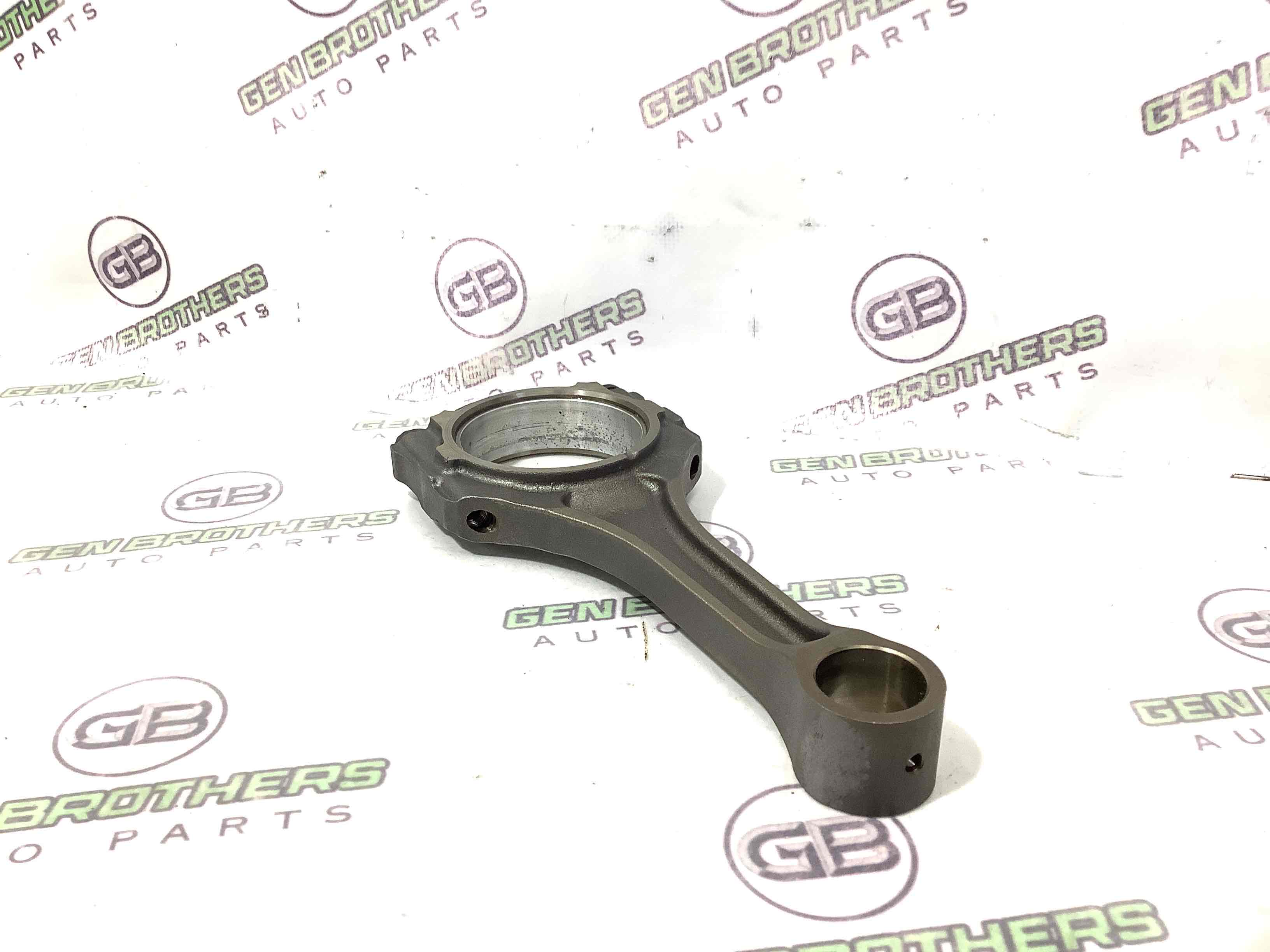 Шатун поршня двигуна