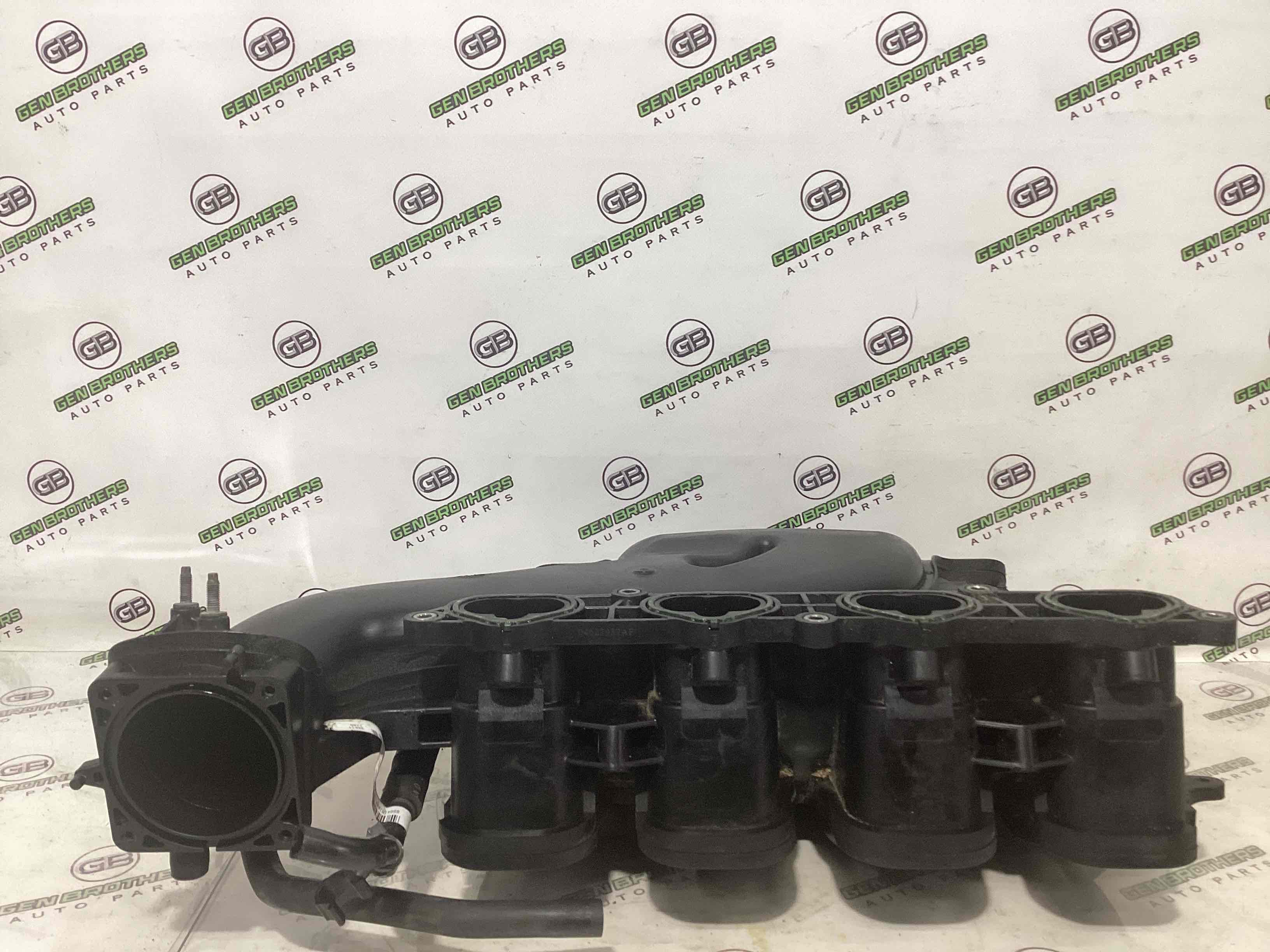 Колектор впускний