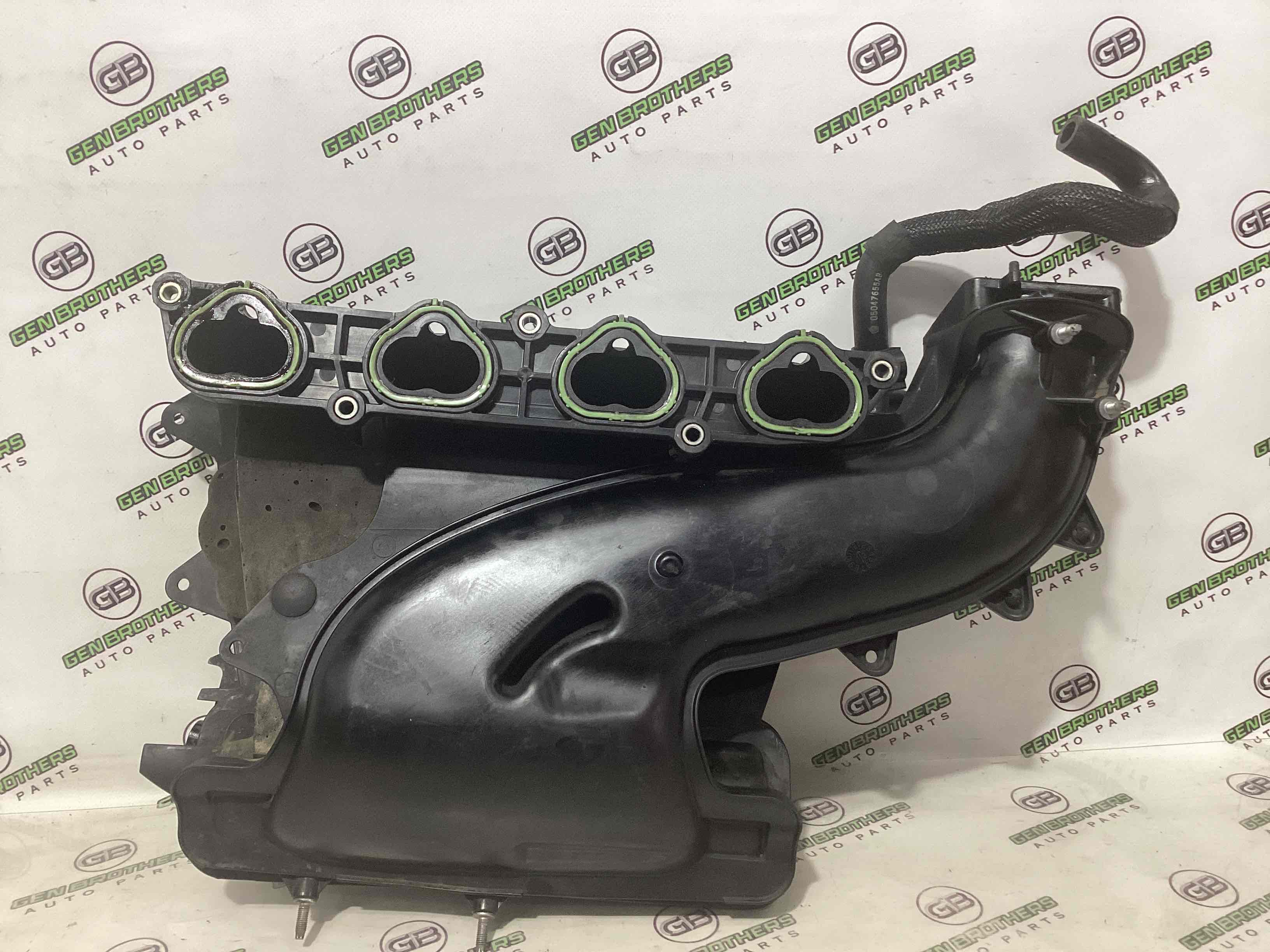 Колектор впускний