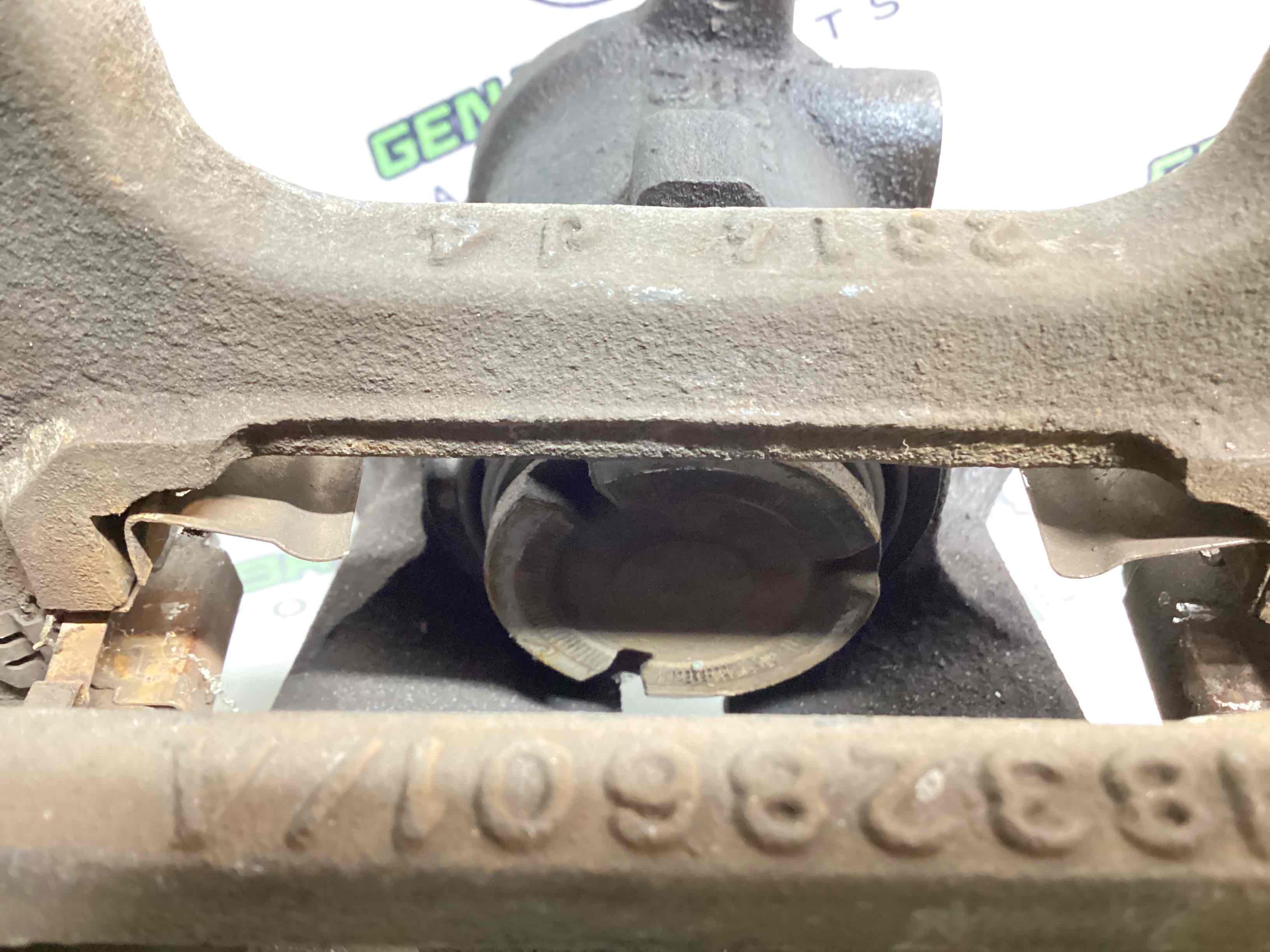 Супорт задній правий