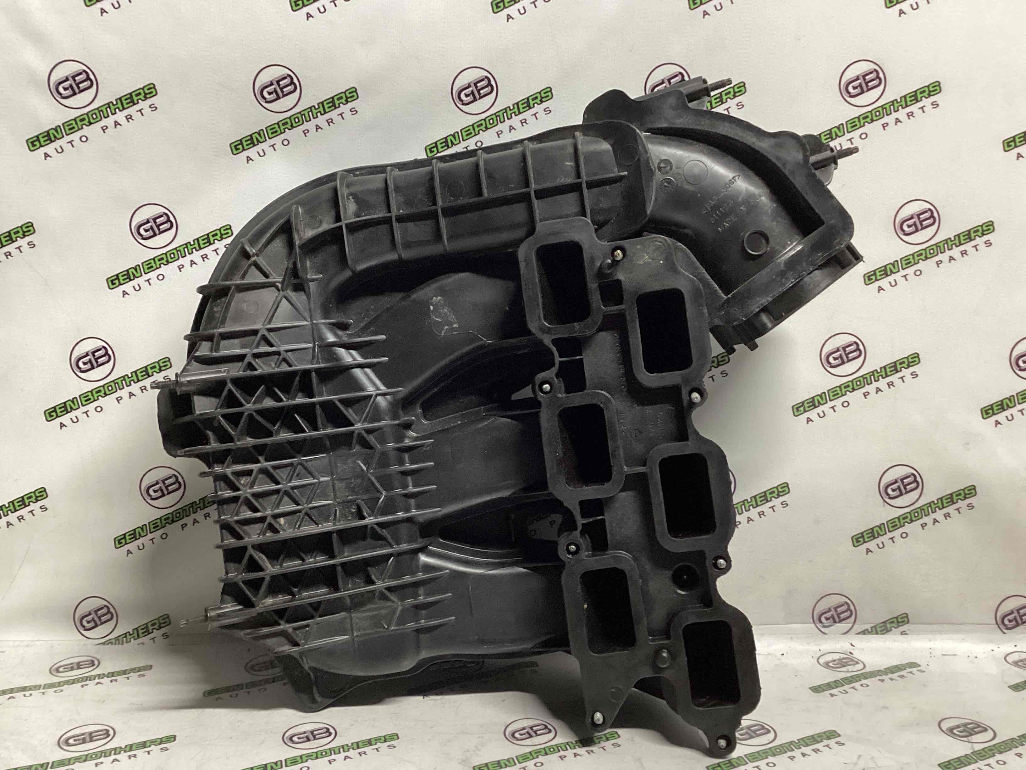 Колектор впускний