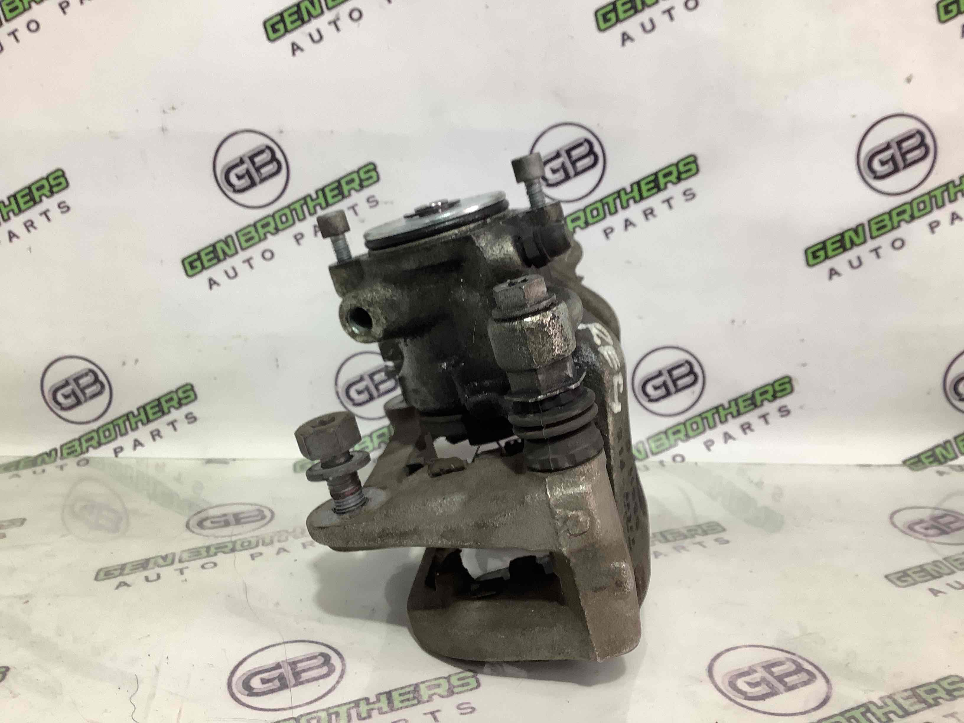 Супорт задній правий