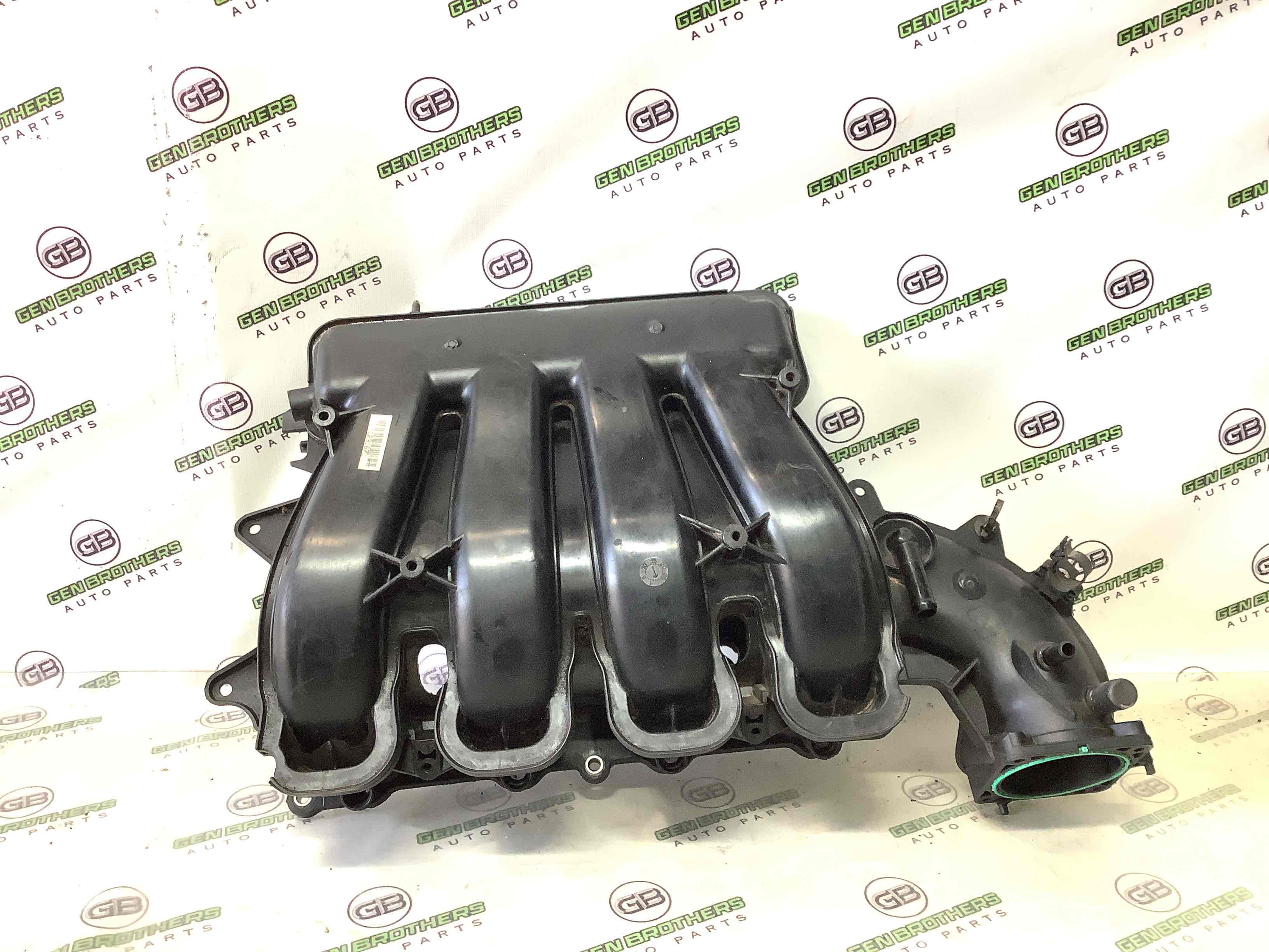 Колектор впускний