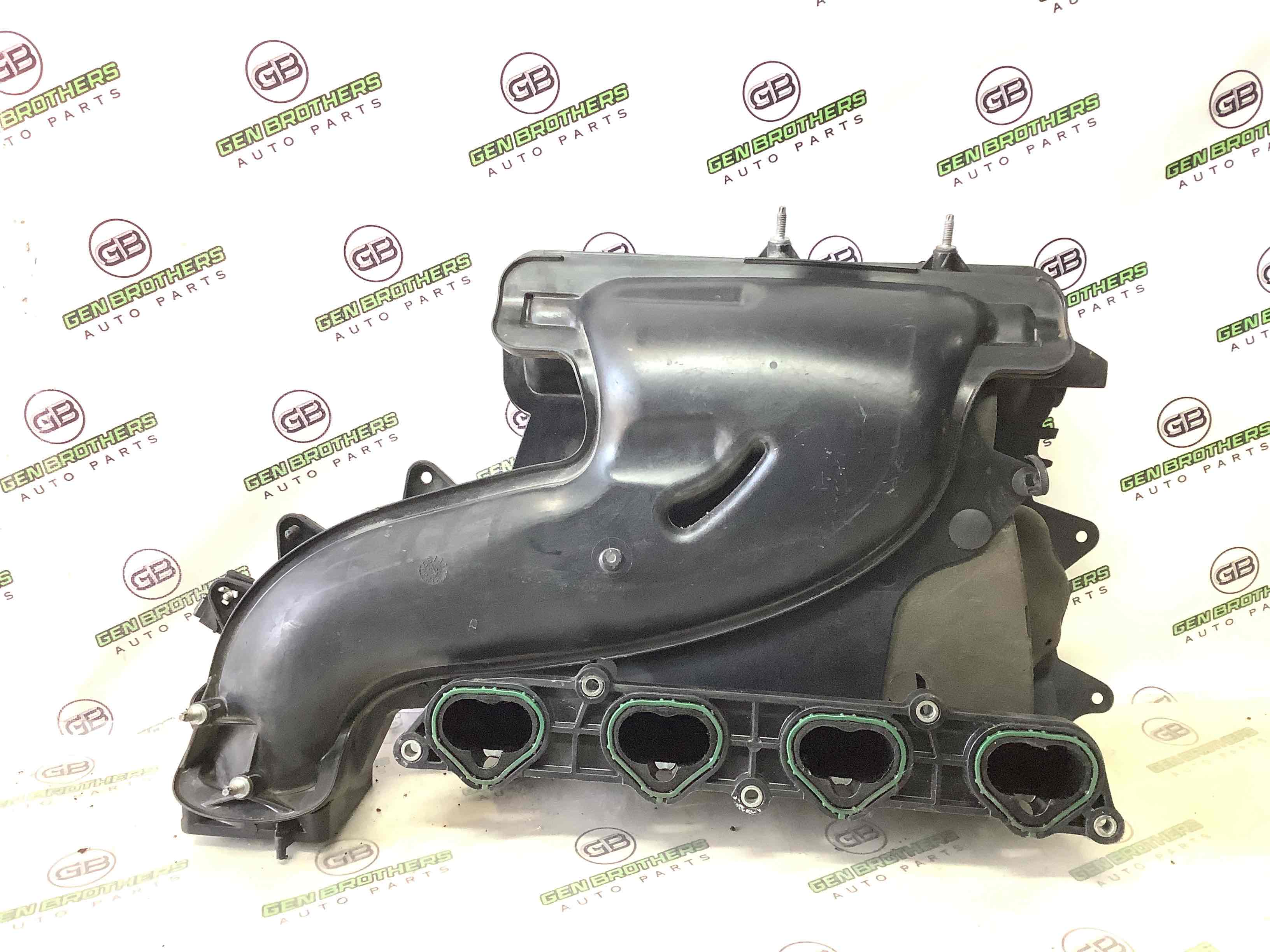 Колектор впускний