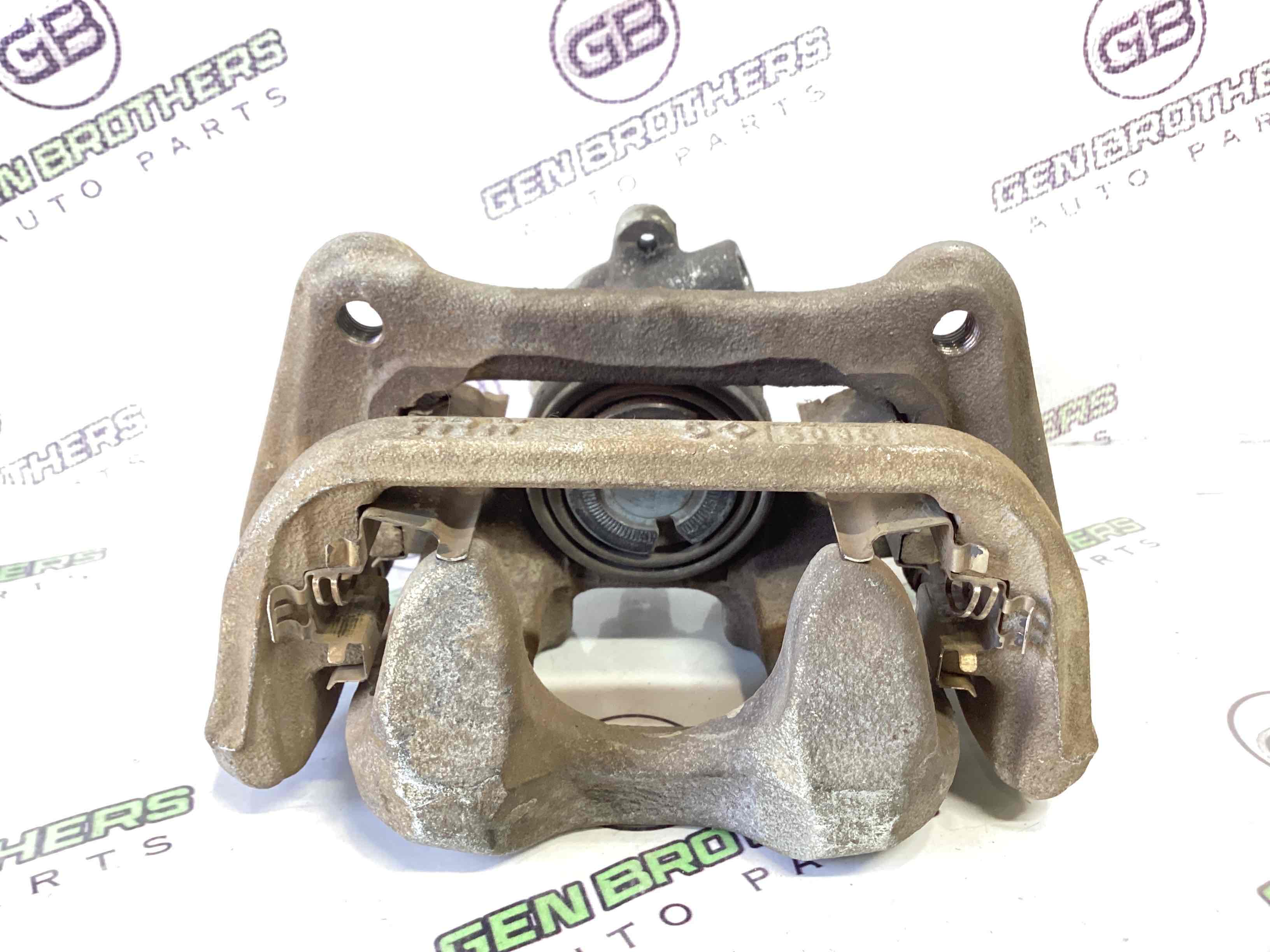 Супорт задній правий