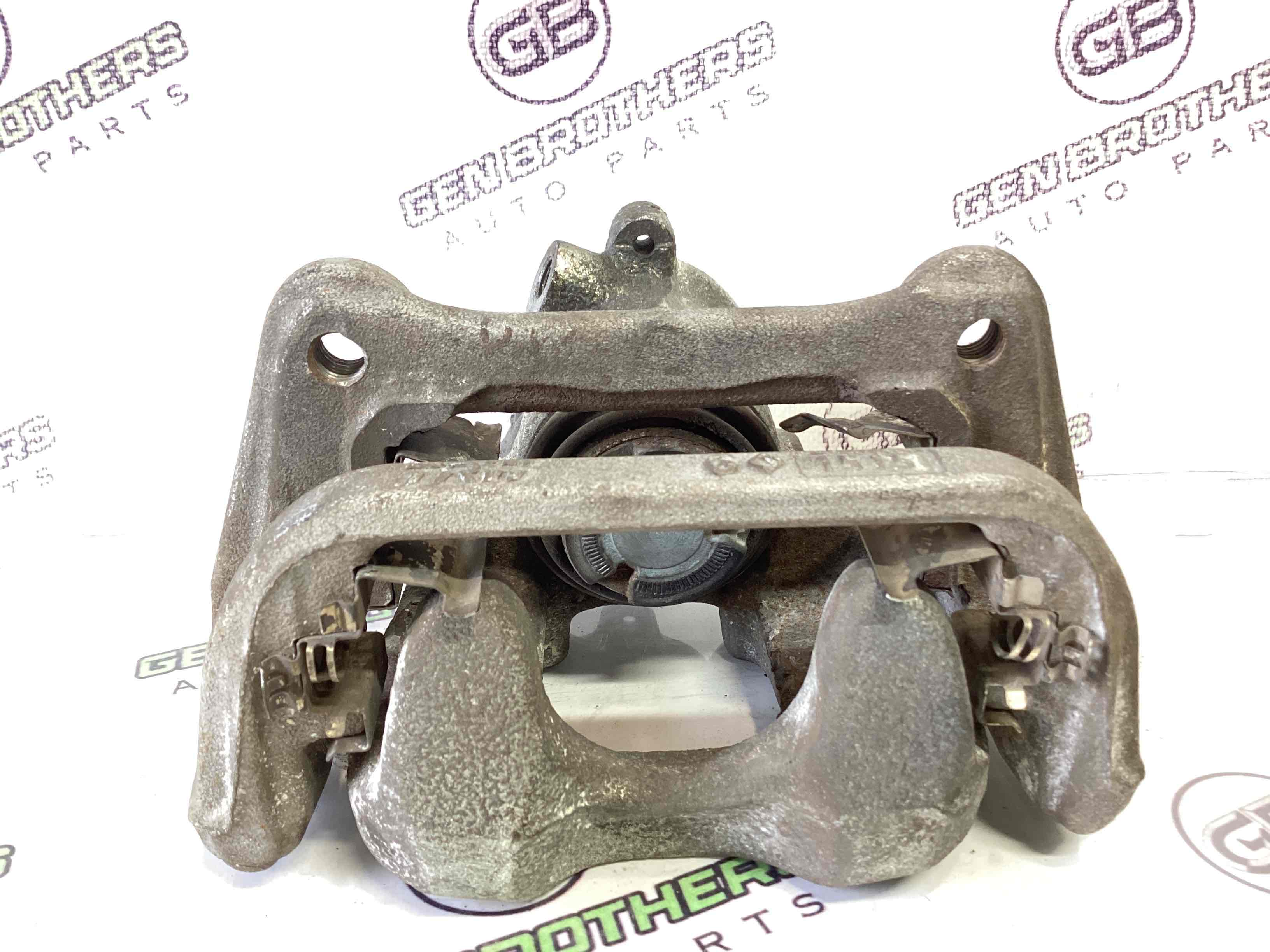 Супорт задній лівий