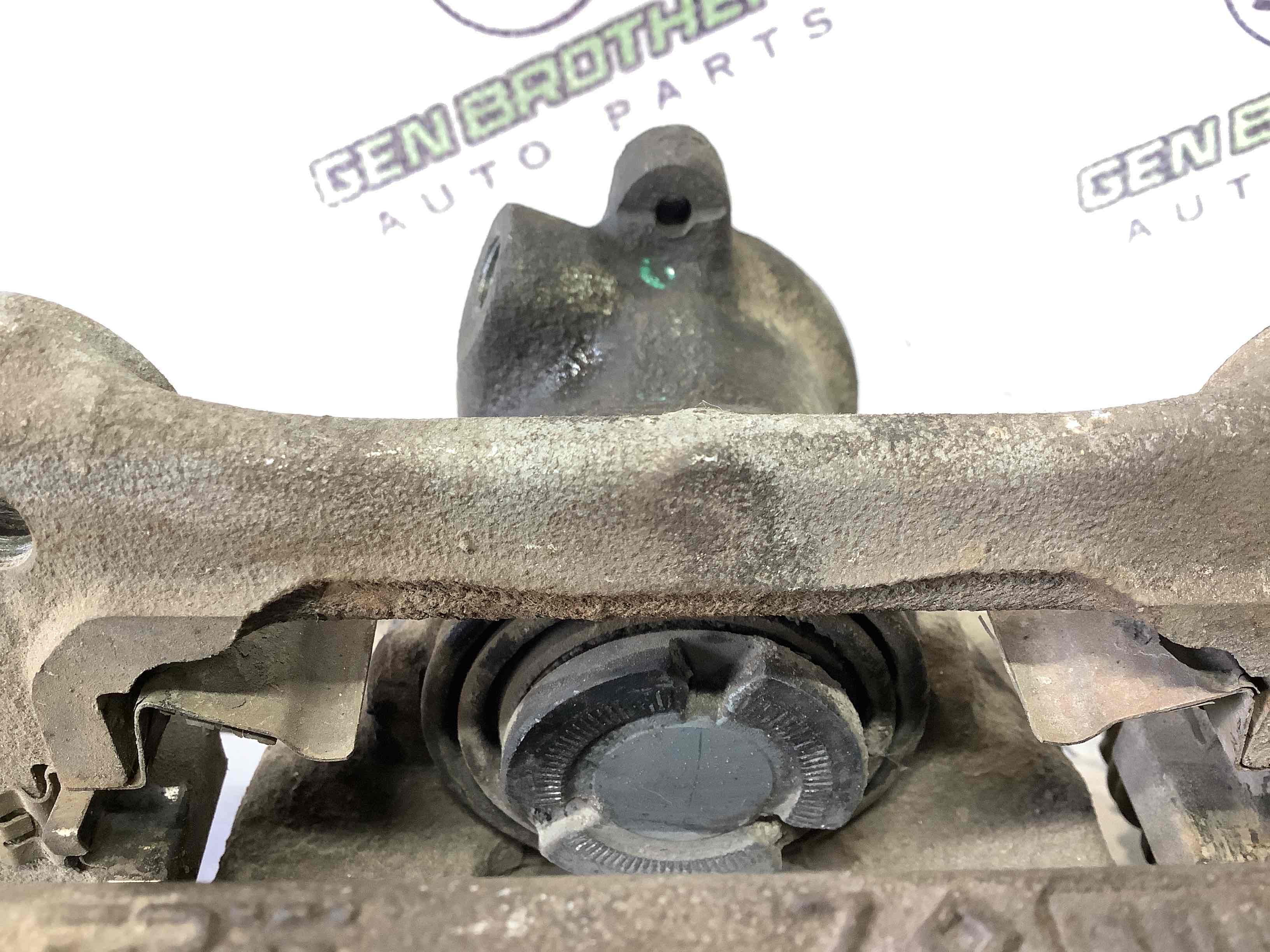 Супорт задній лівий