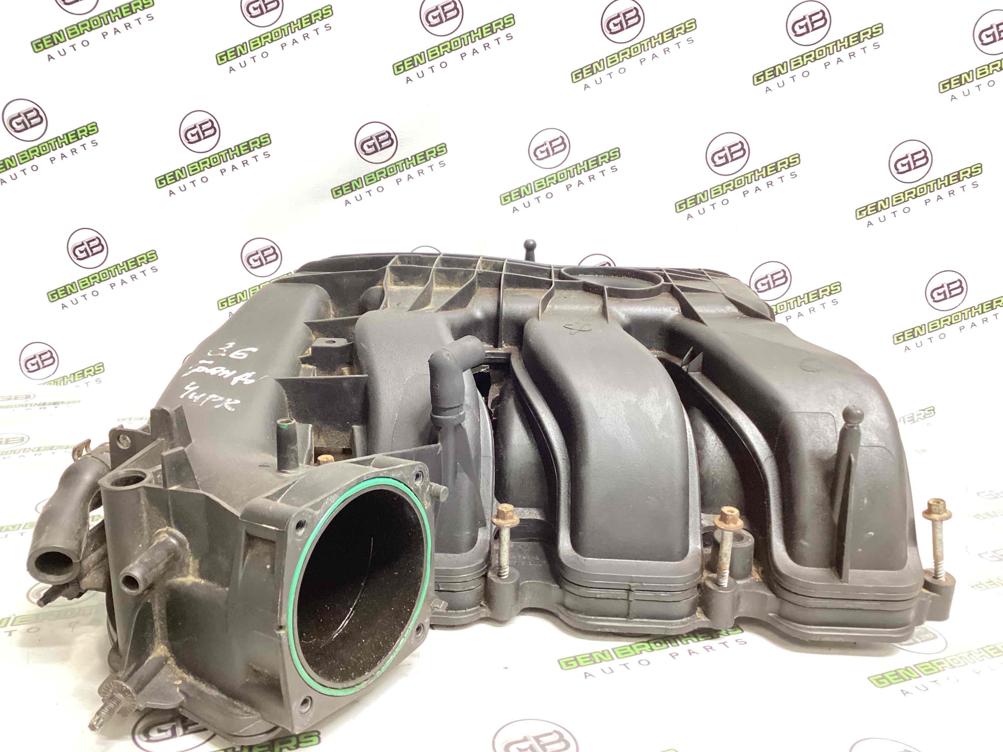 Колектор впускний