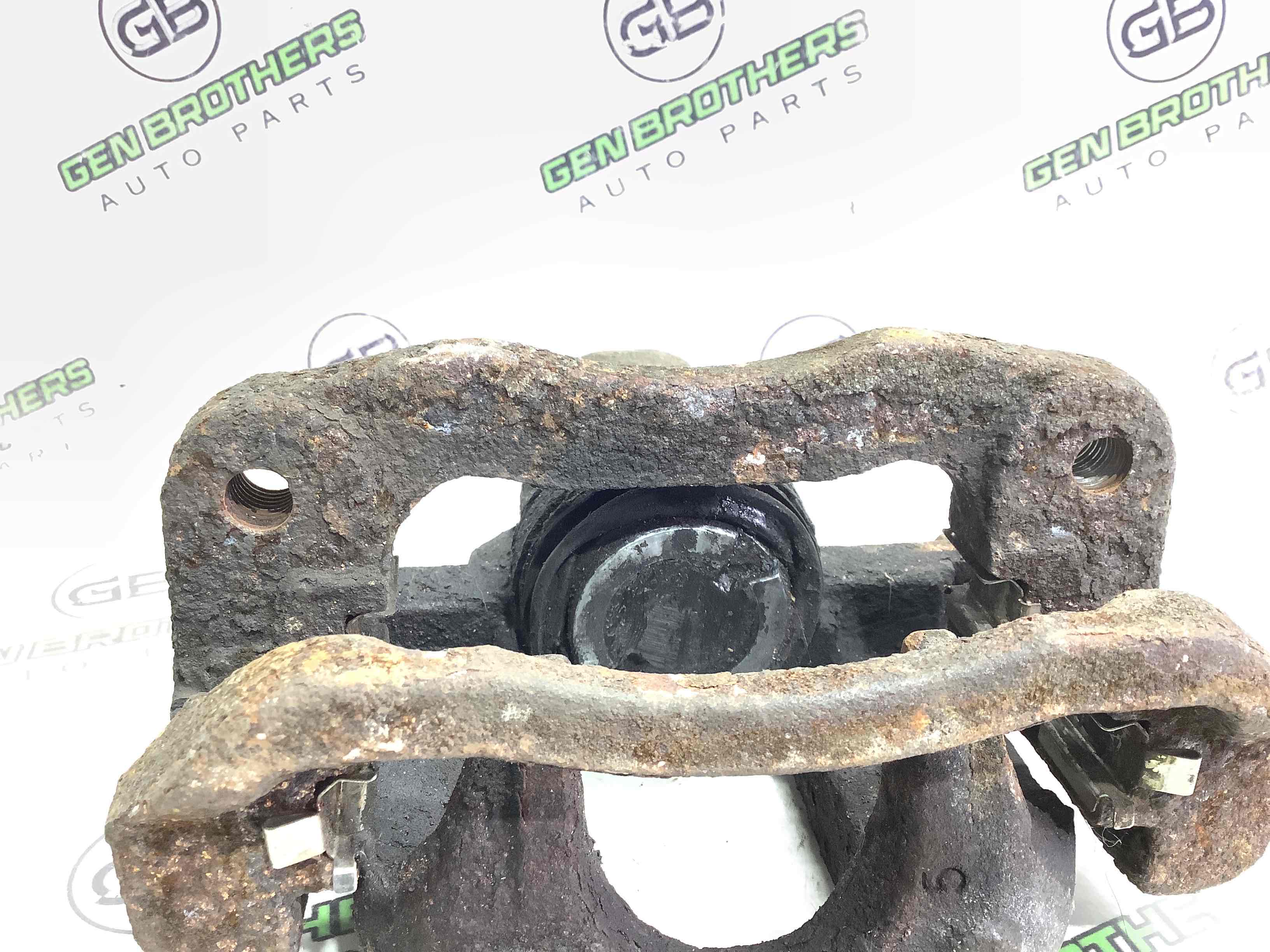 Супорт задній лівий