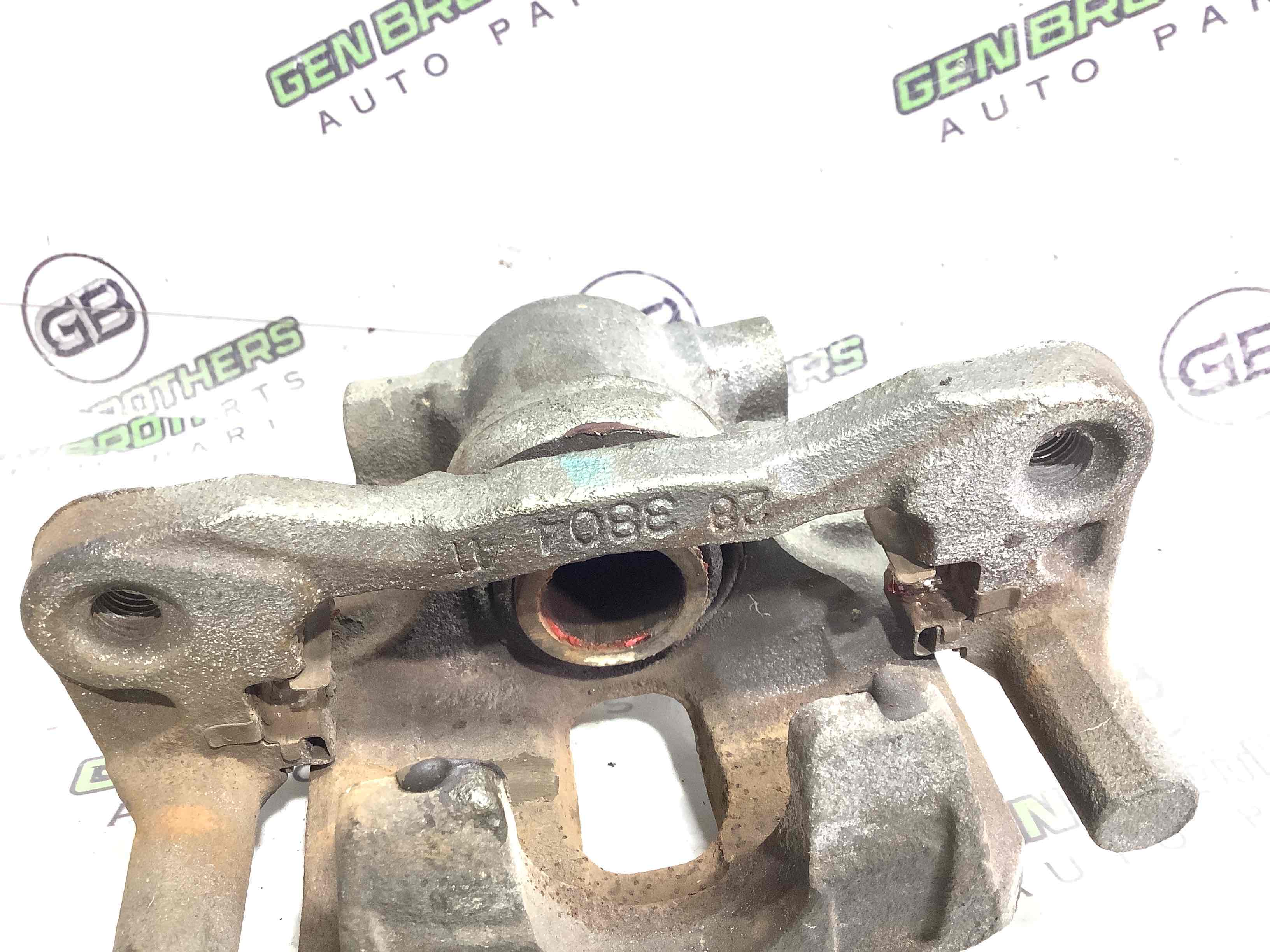 Супорт задній лівий