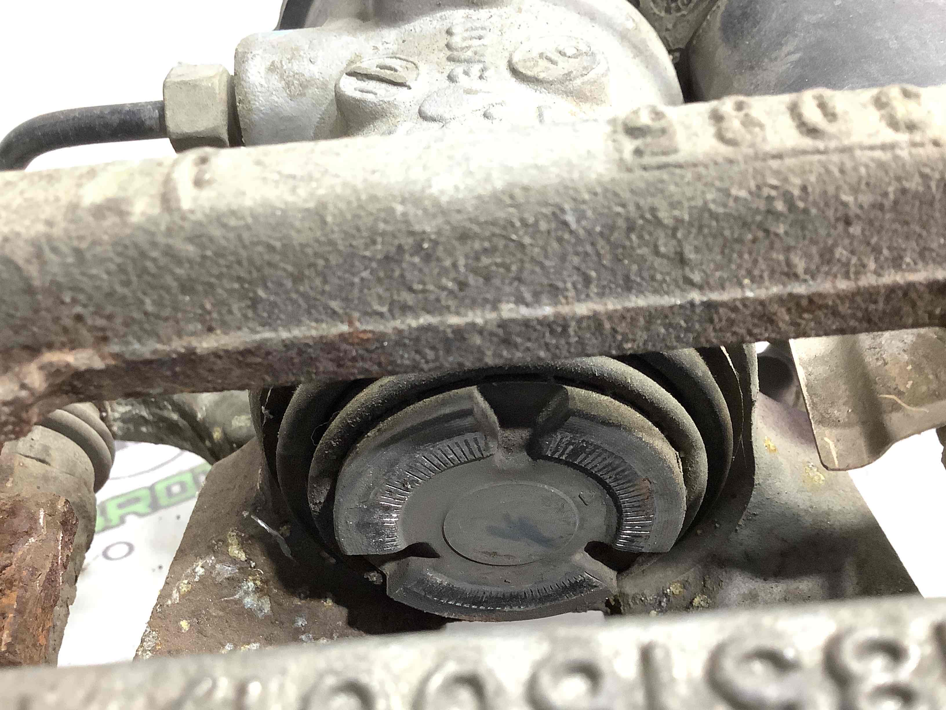 Супорт задній правий