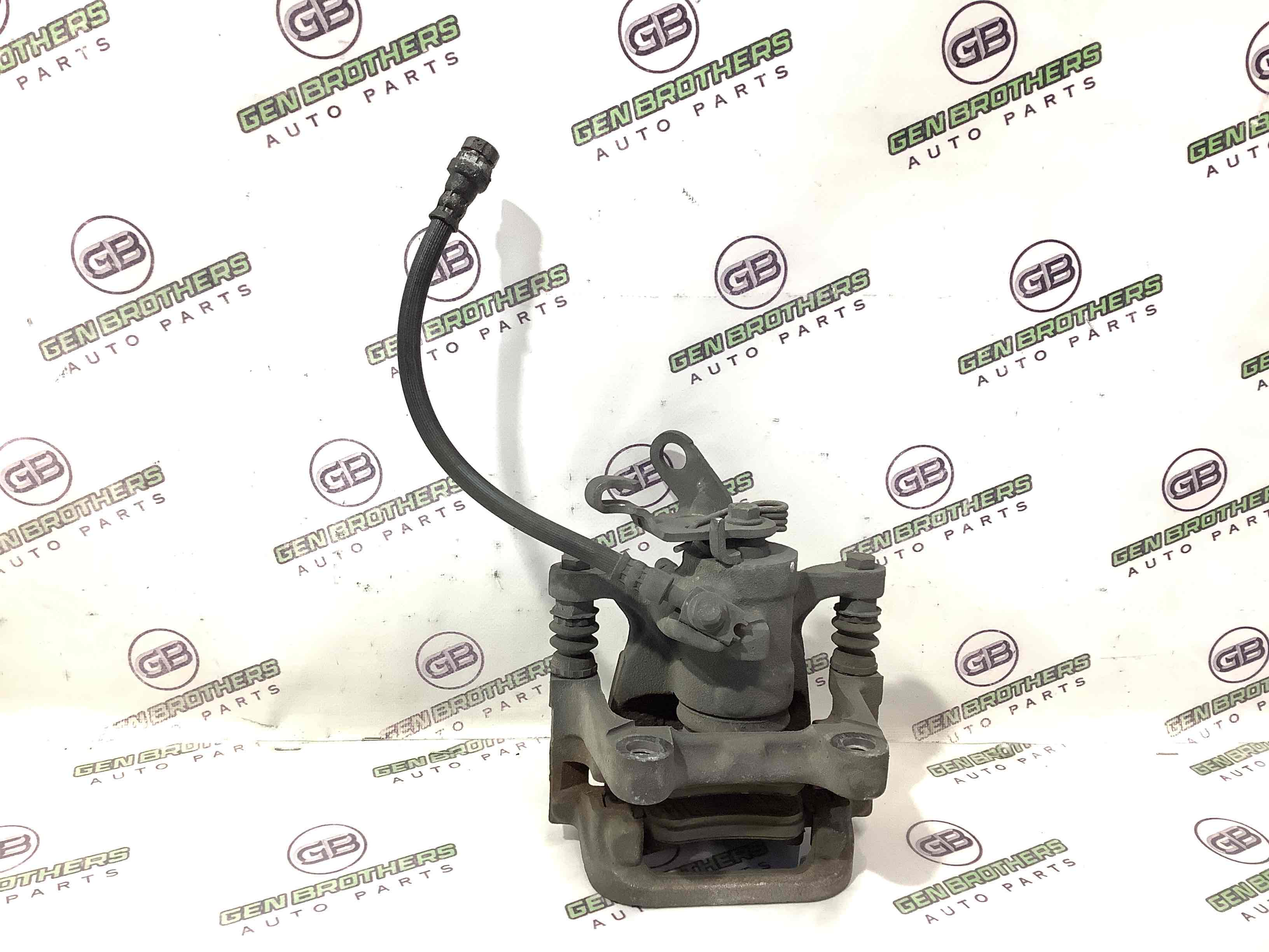 Супорт задній лівий