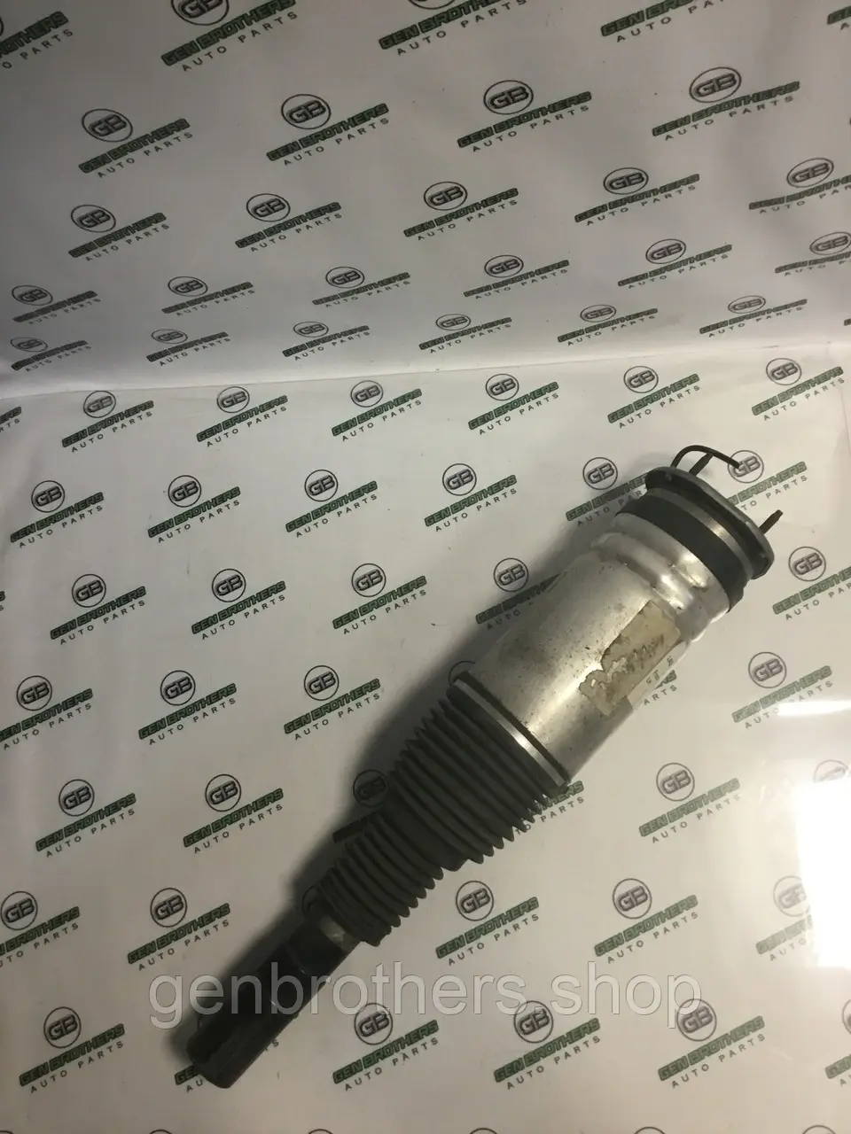 Амортизатор передний левый