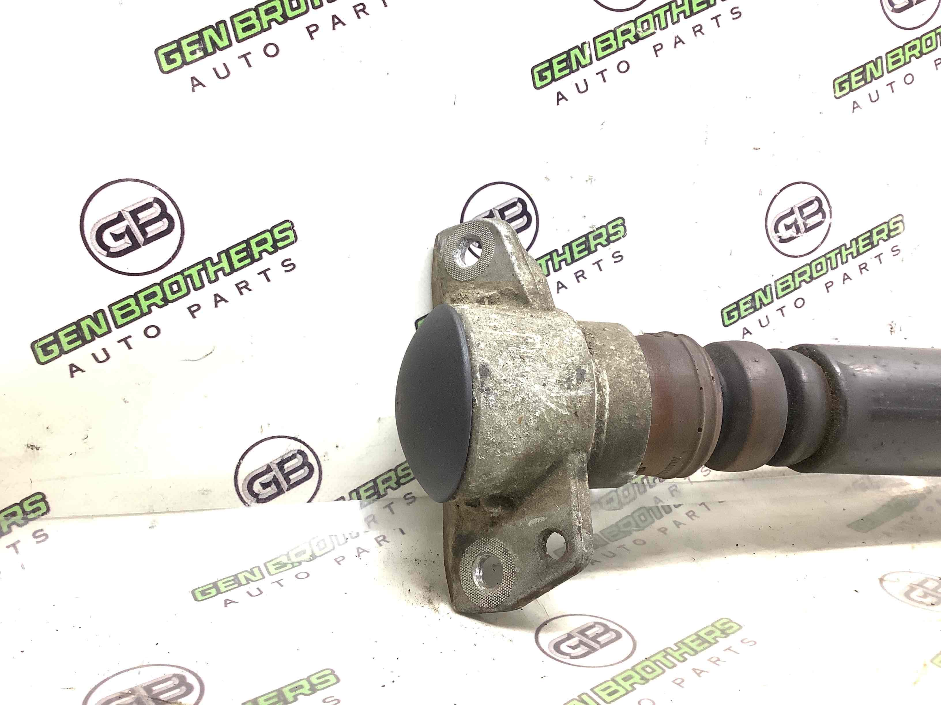 Амортизатор задній лівий