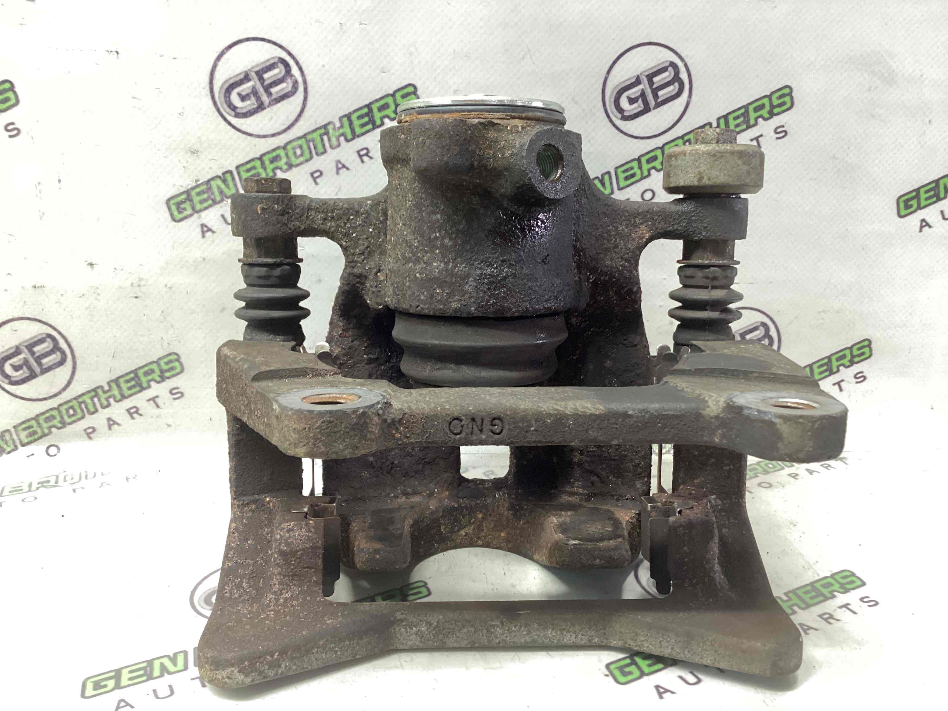 Супорт задній правий