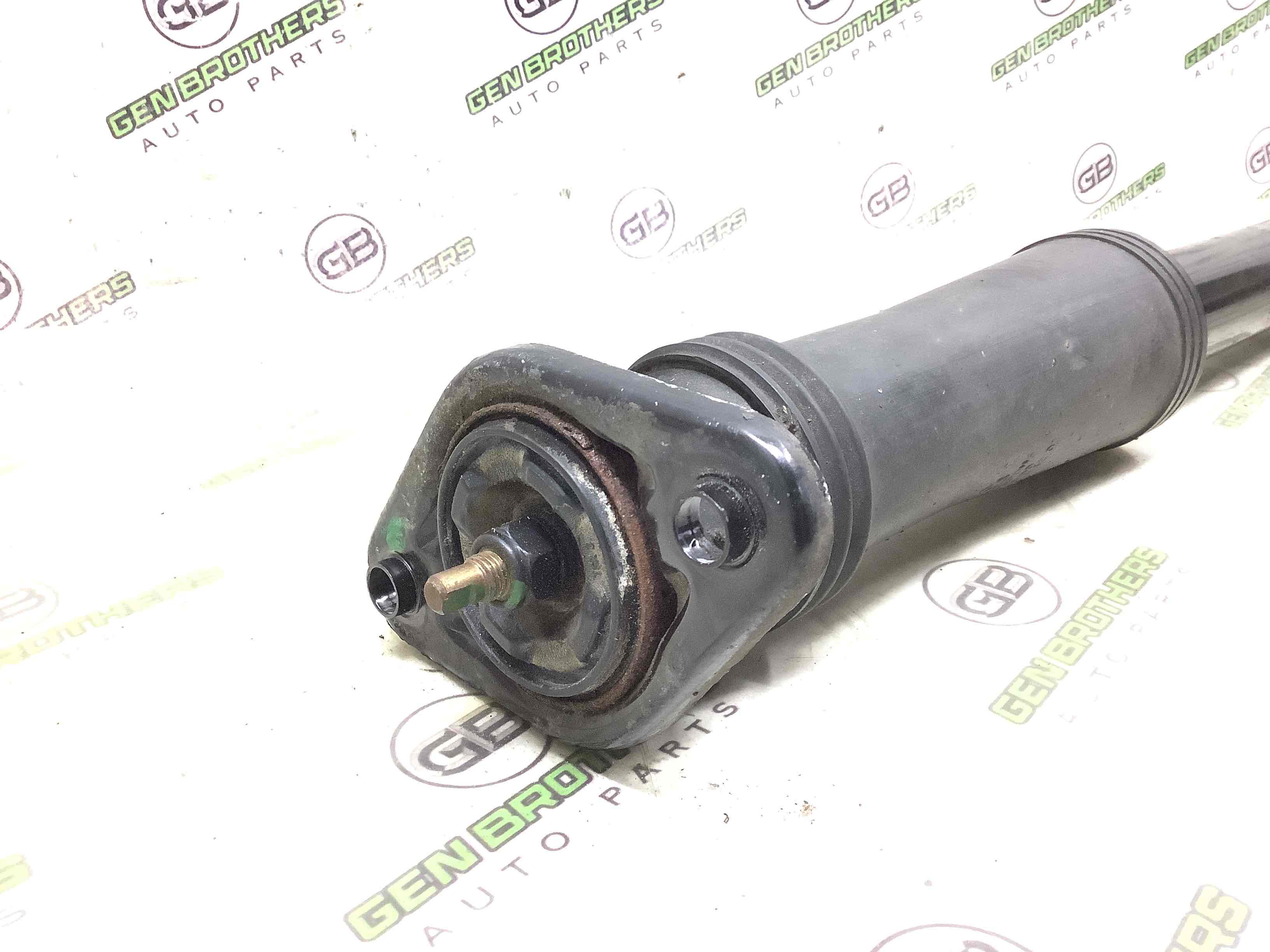 Амортизатор задній лівий