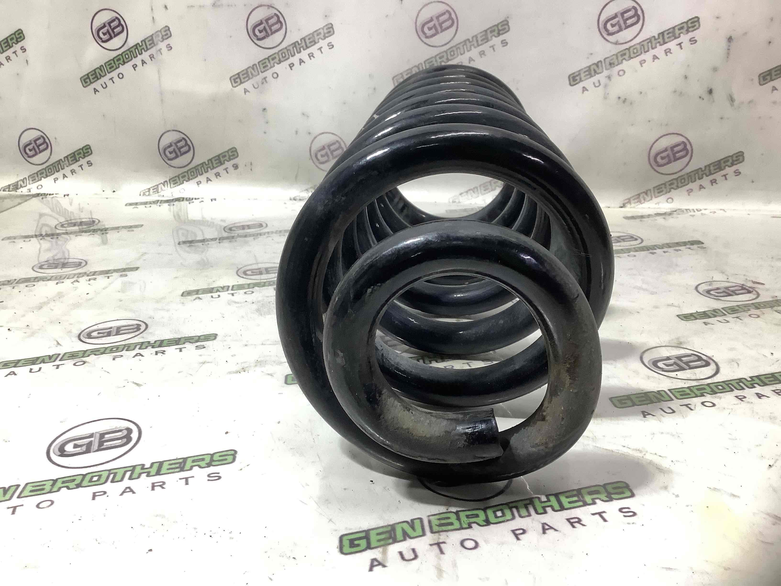 Пружина задня