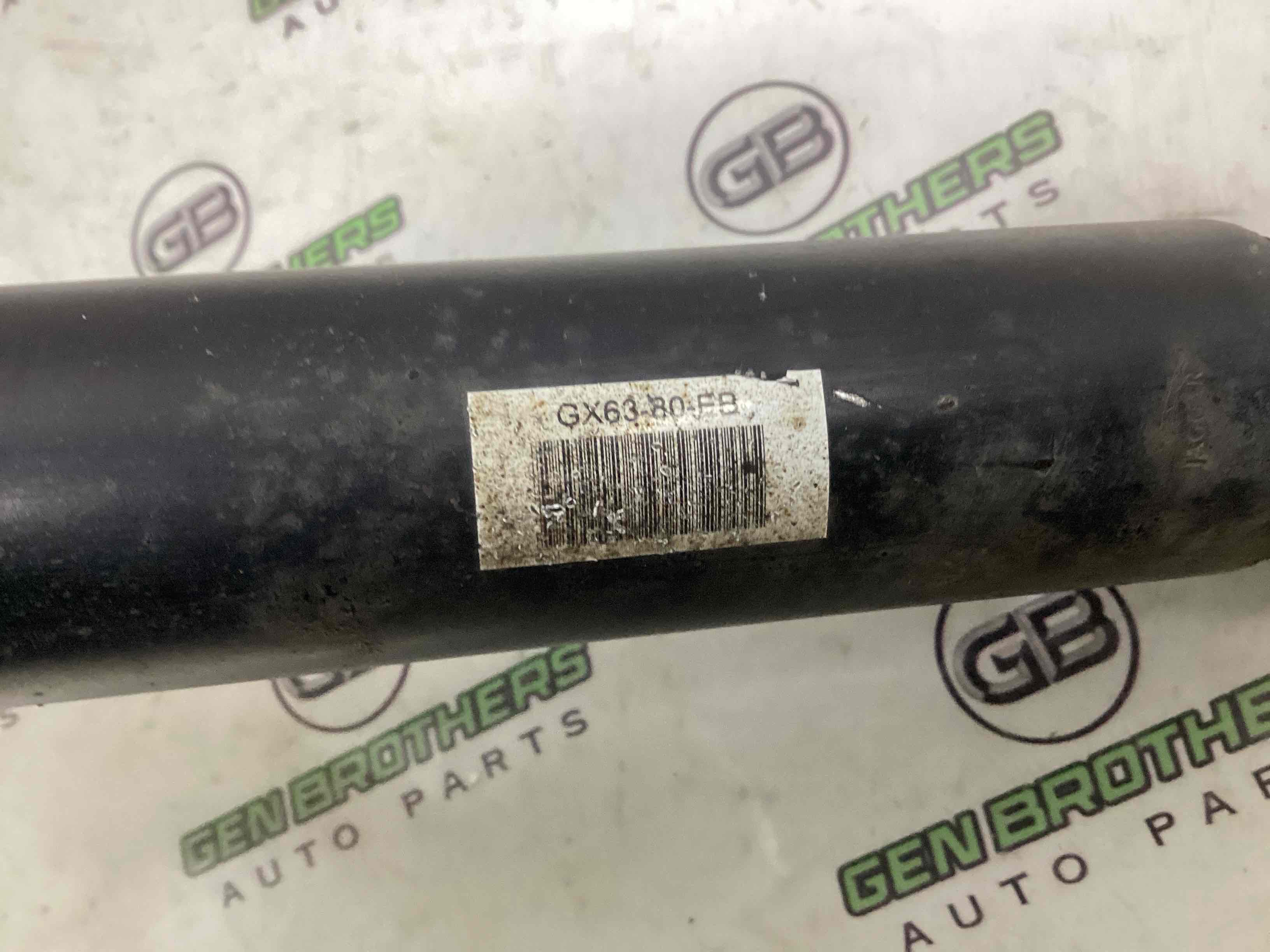 Амортизатор задній лівий