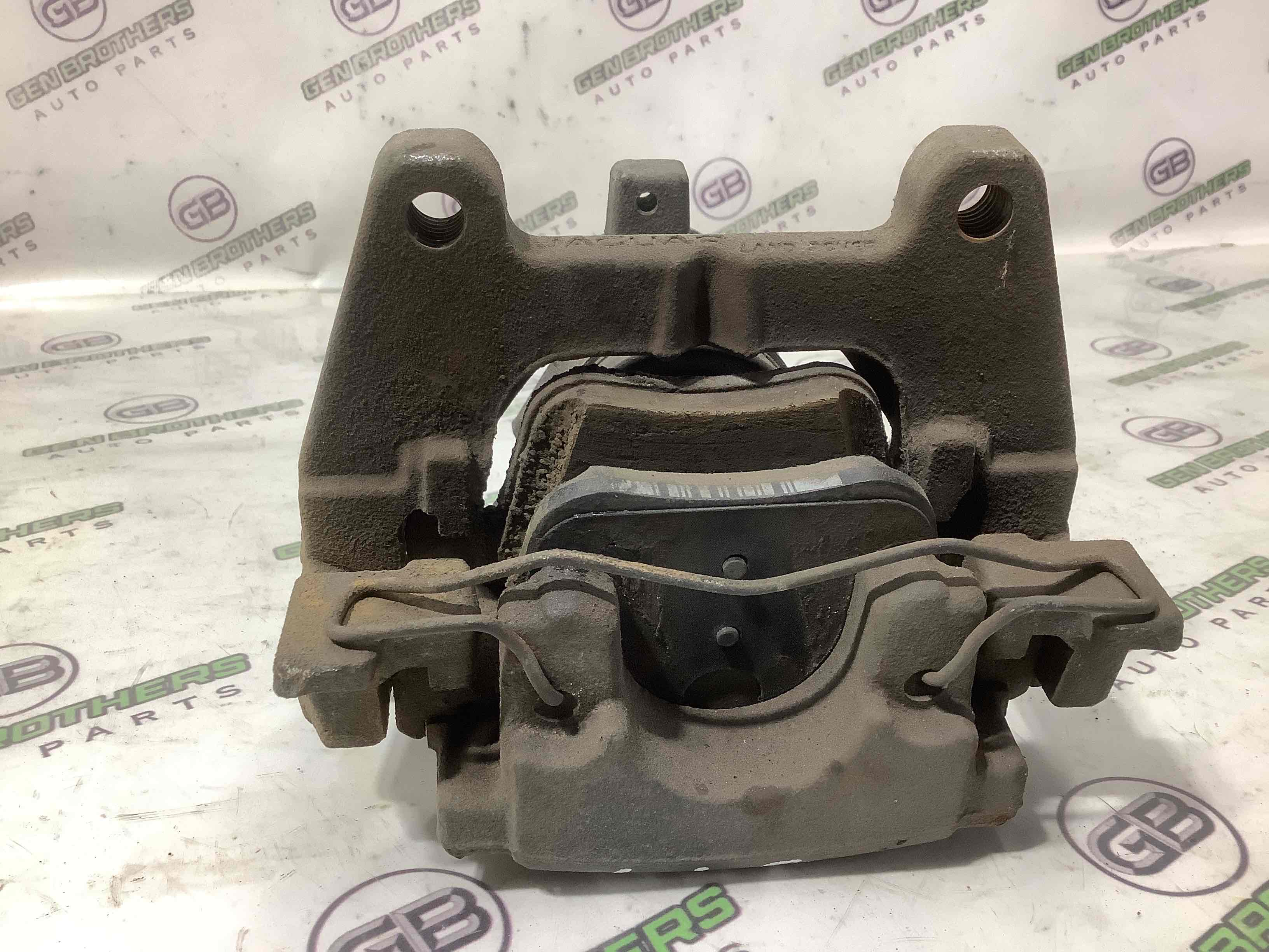 Супорт задній лівий