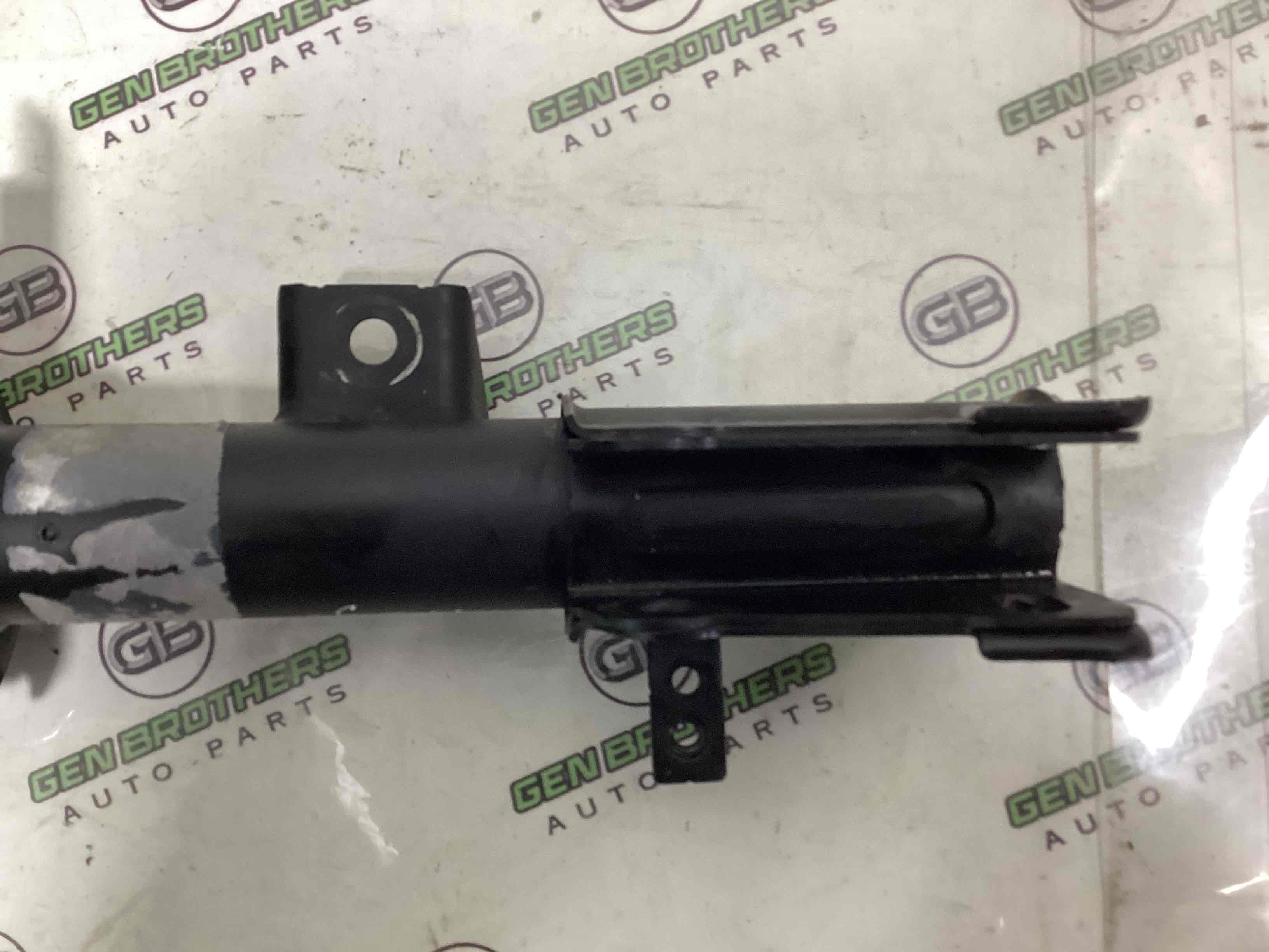 Амортизатор передний левый