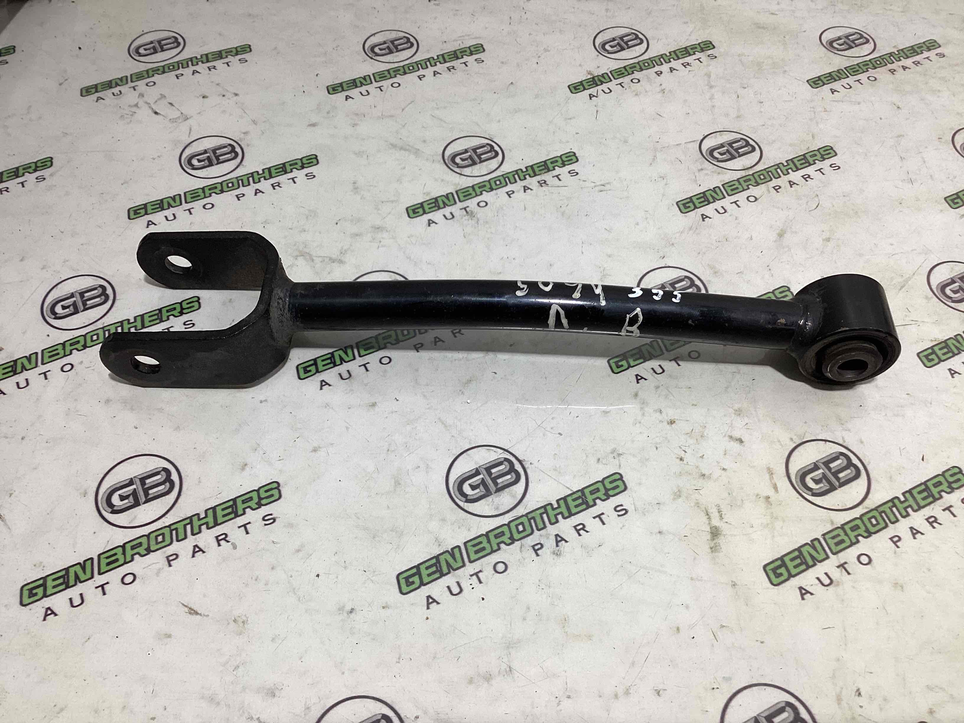 Рычаг задний