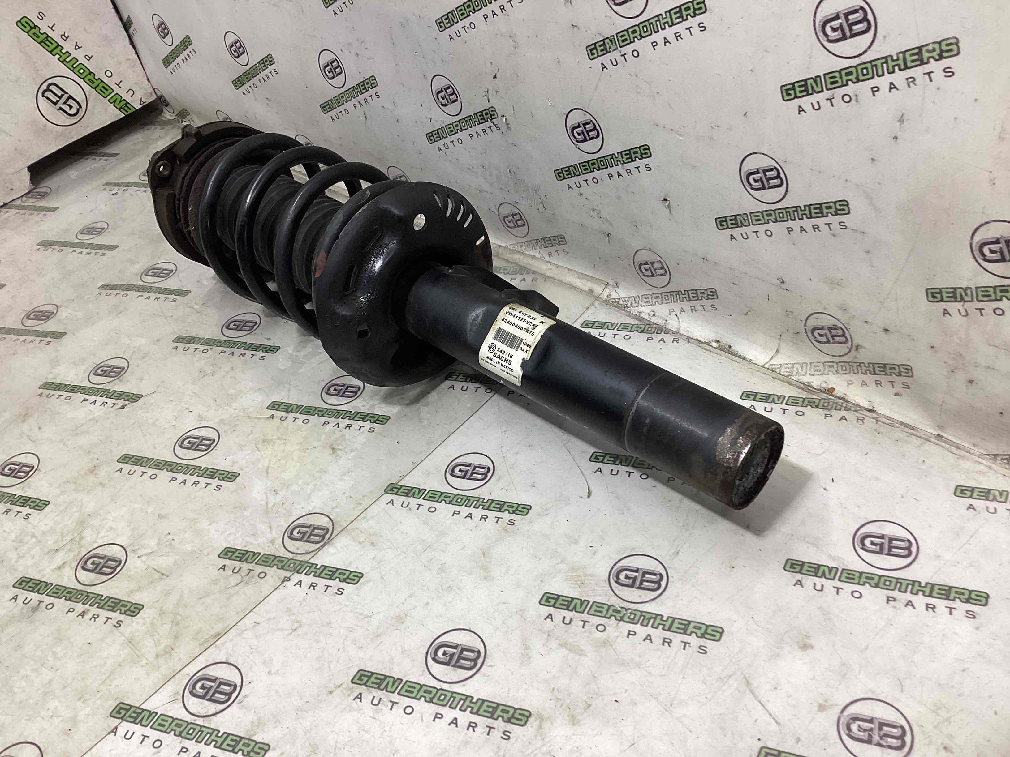 Амортизатор передній лівий