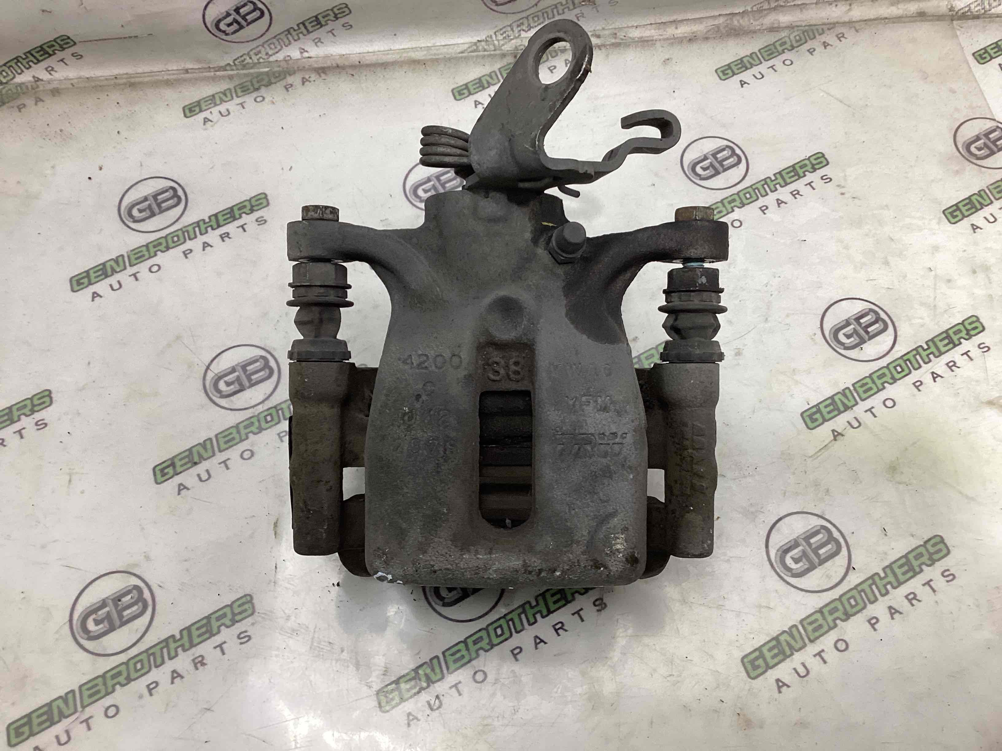 Супорт задній лівий