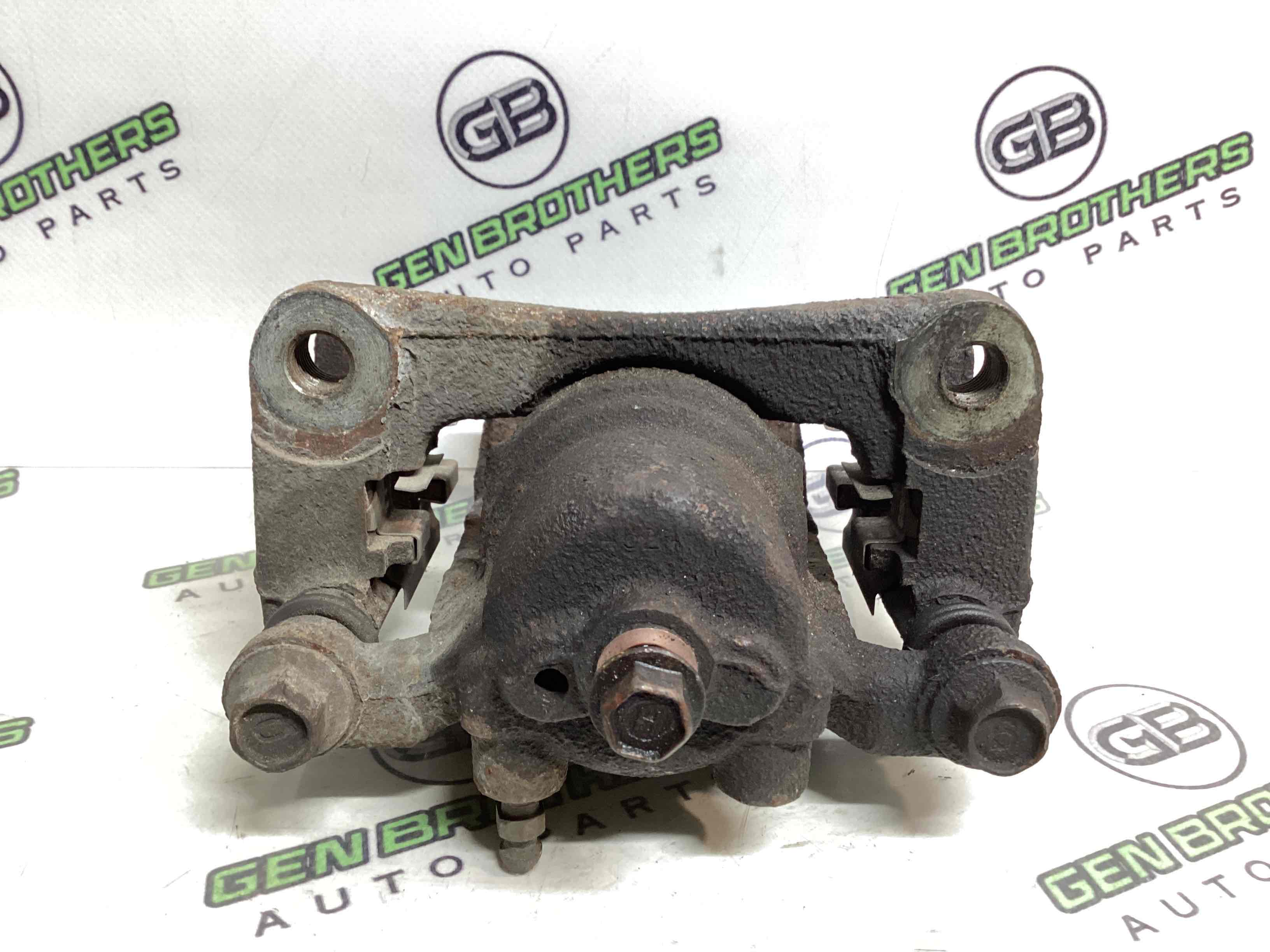 Супорт задній правий