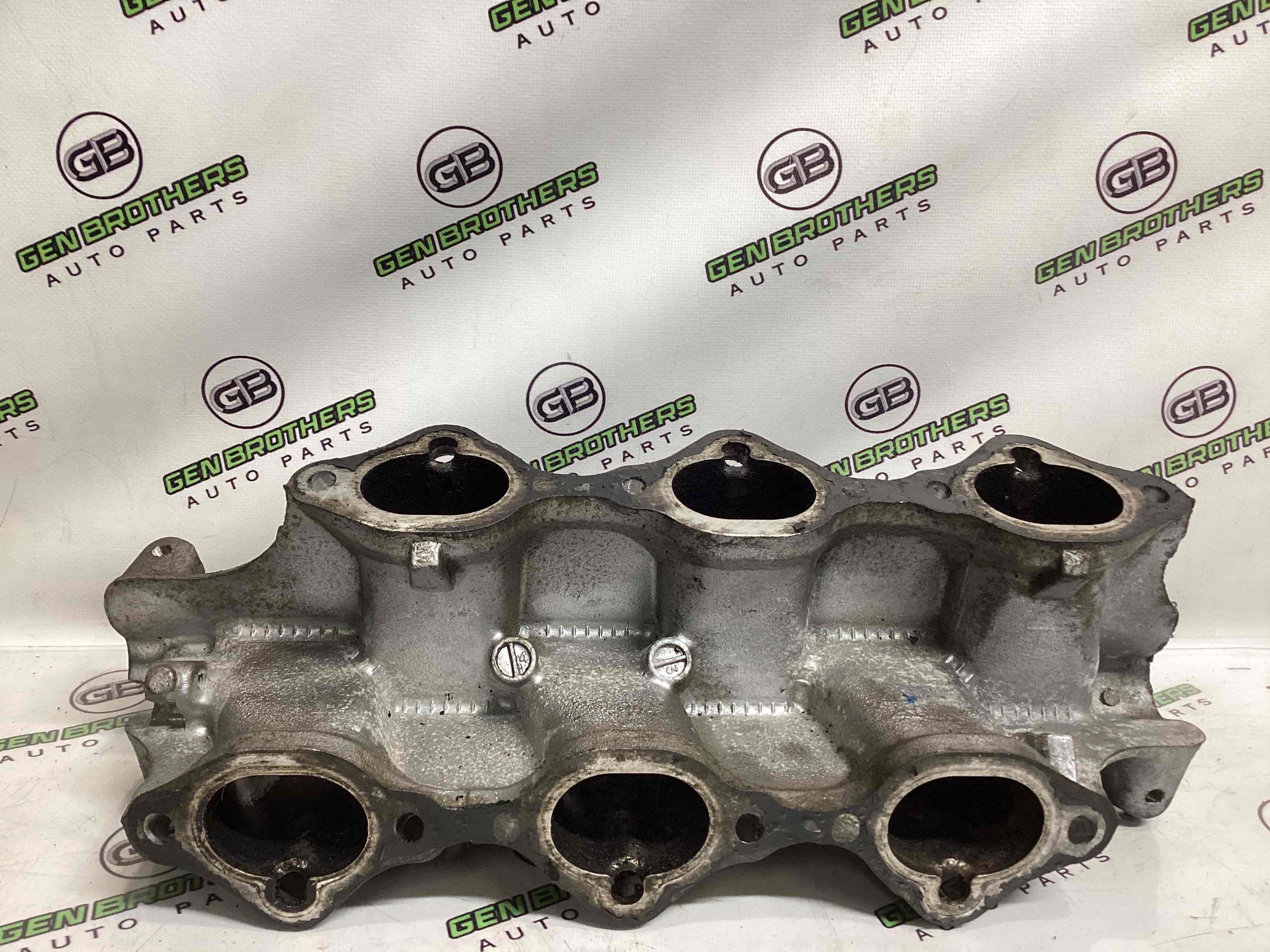 Колектор впускний