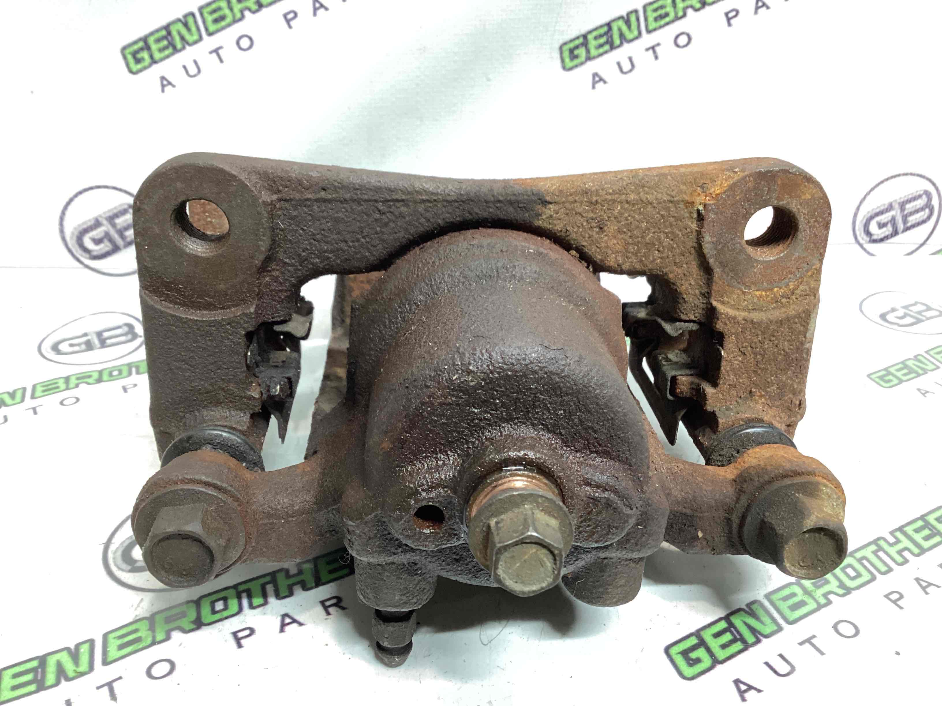 Супорт задній правий