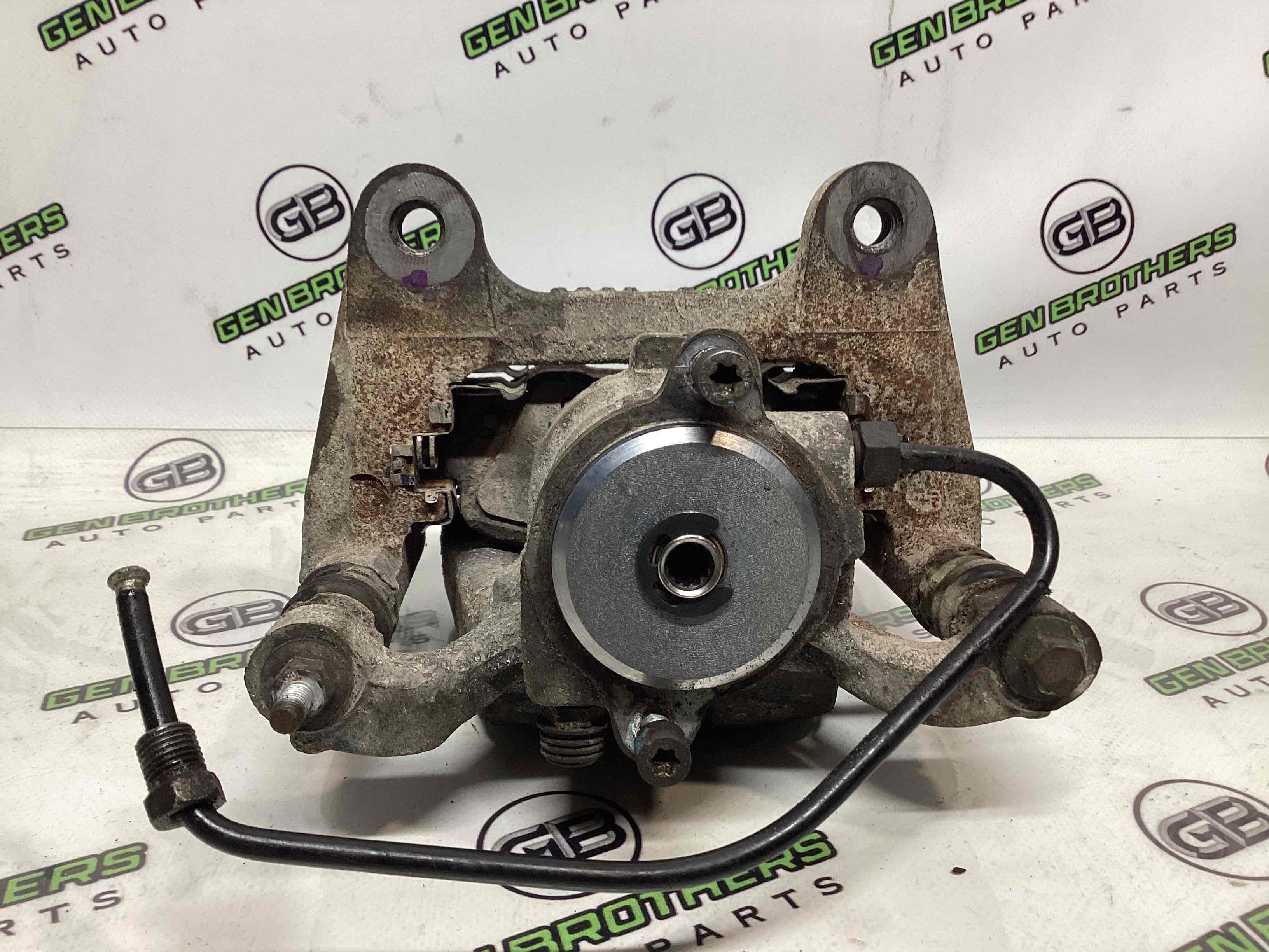 Супорт задній лівий