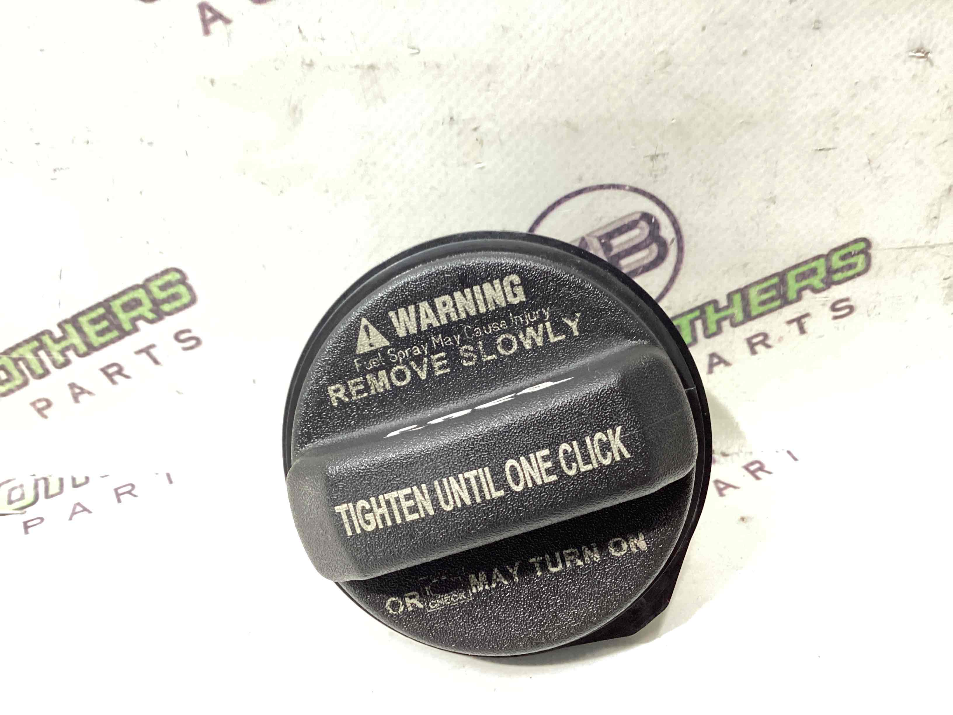 Корок бака, кришка заливної горловини, дотяжка