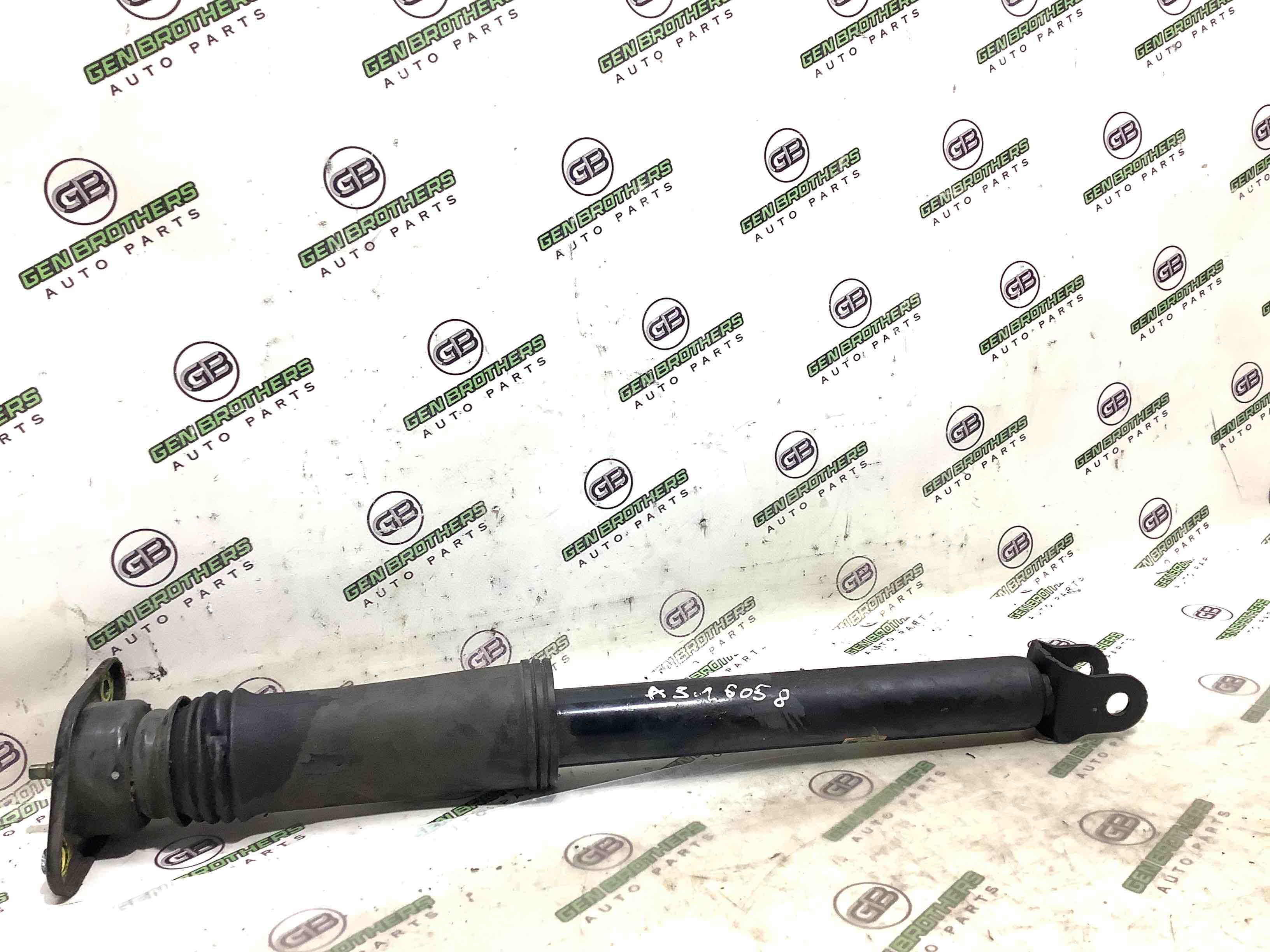 Амортизатор задній лівий